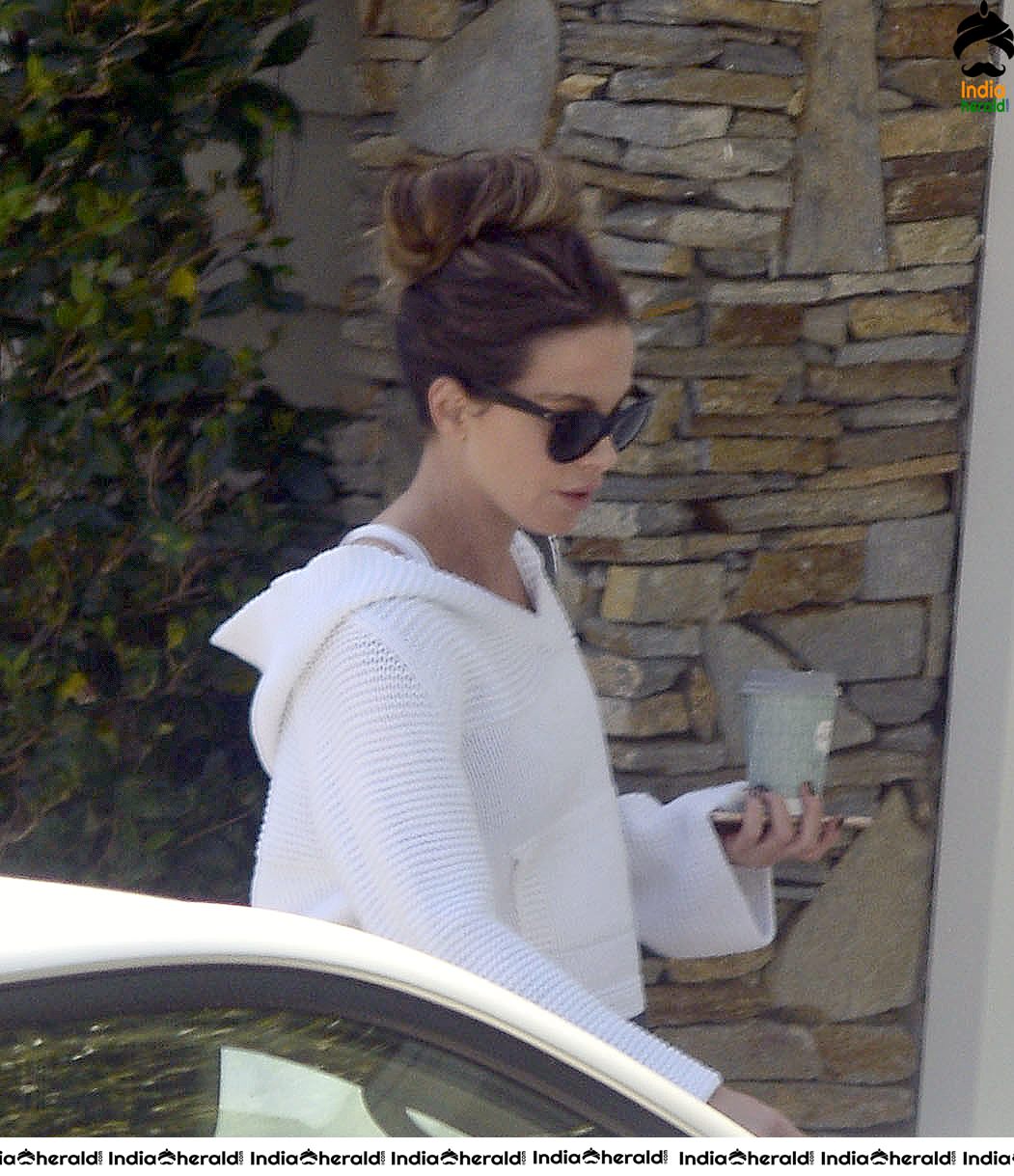 Kate Beckinsale in White Transparent Top and takes a walk at LA