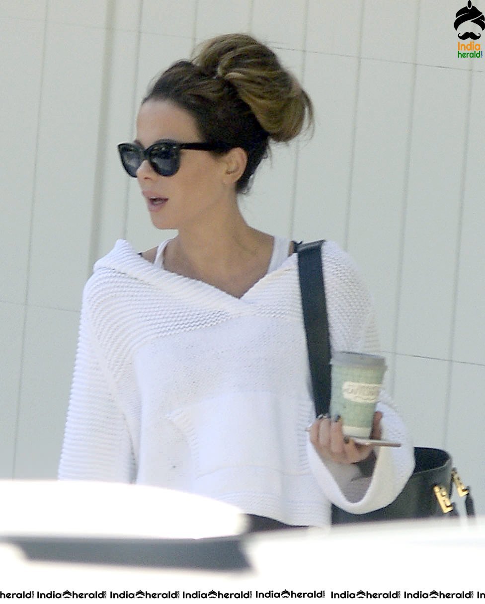 Kate Beckinsale in White Transparent Top and takes a walk at LA