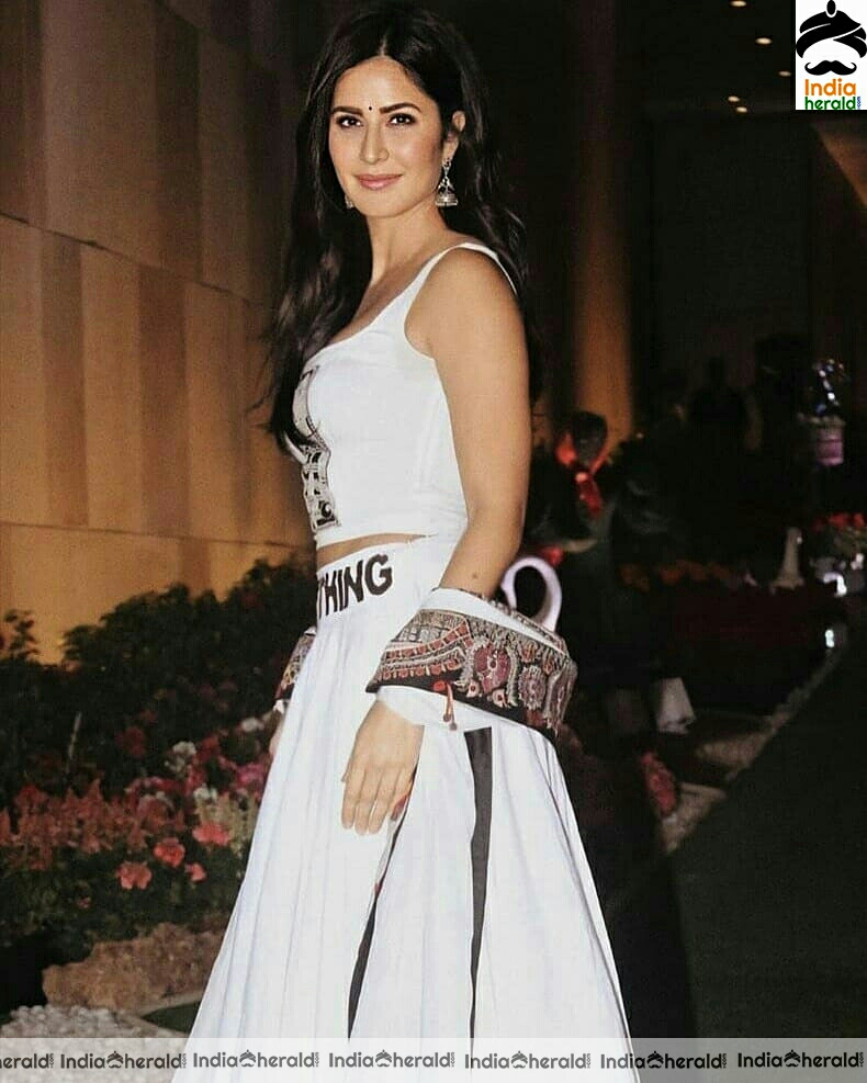 Katrina kaif Showing A Sexy Waist Line In White Sleeveless Dress Stills