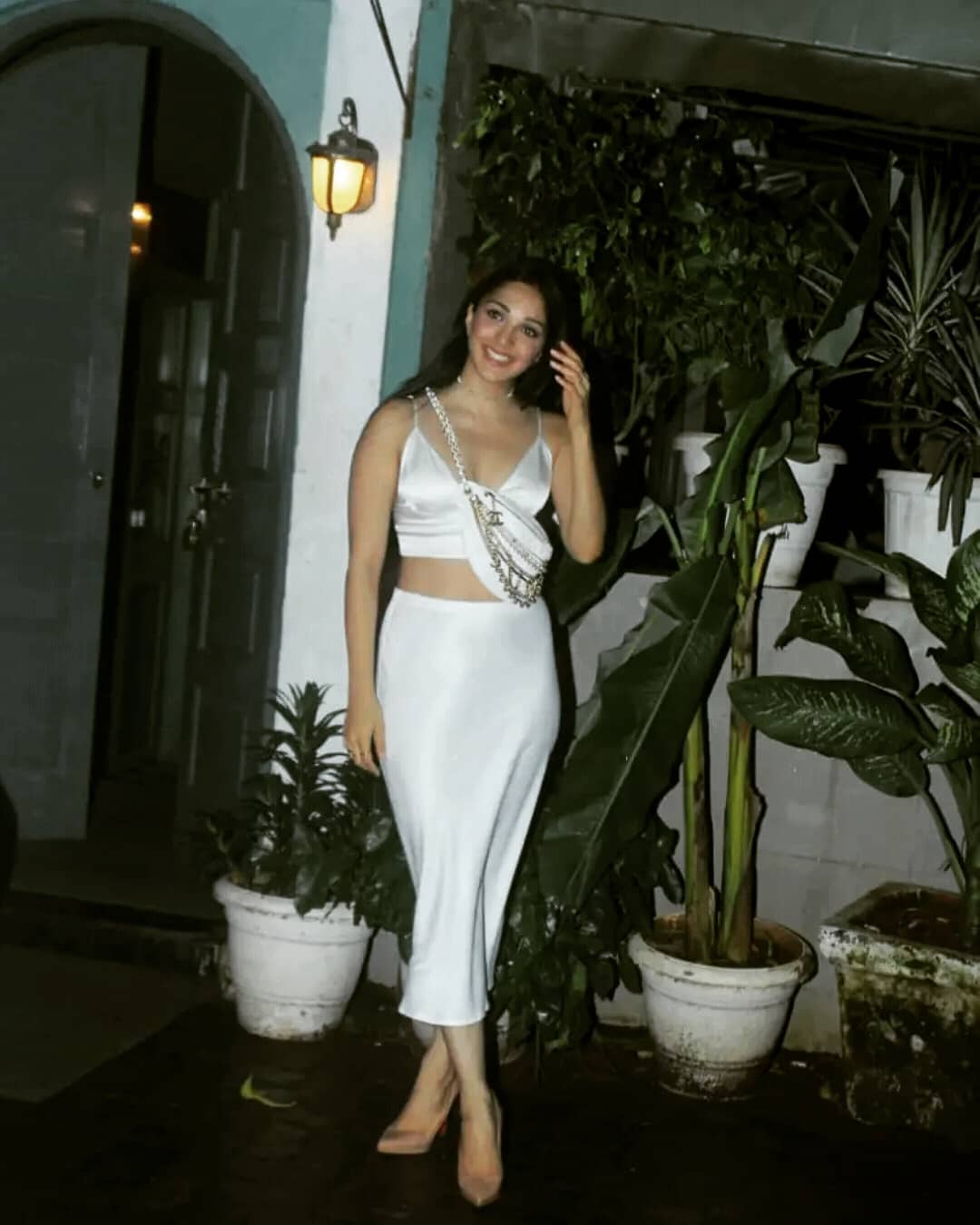 Kiara Advani Hot In Silk Satin Sleeveless Blouse