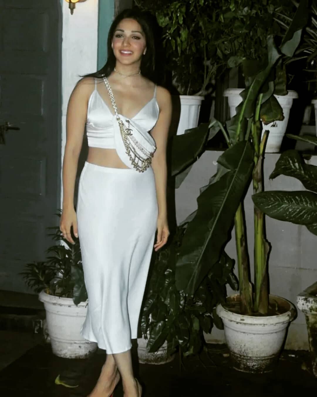 Kiara Advani Hot In Silk Satin Sleeveless Blouse