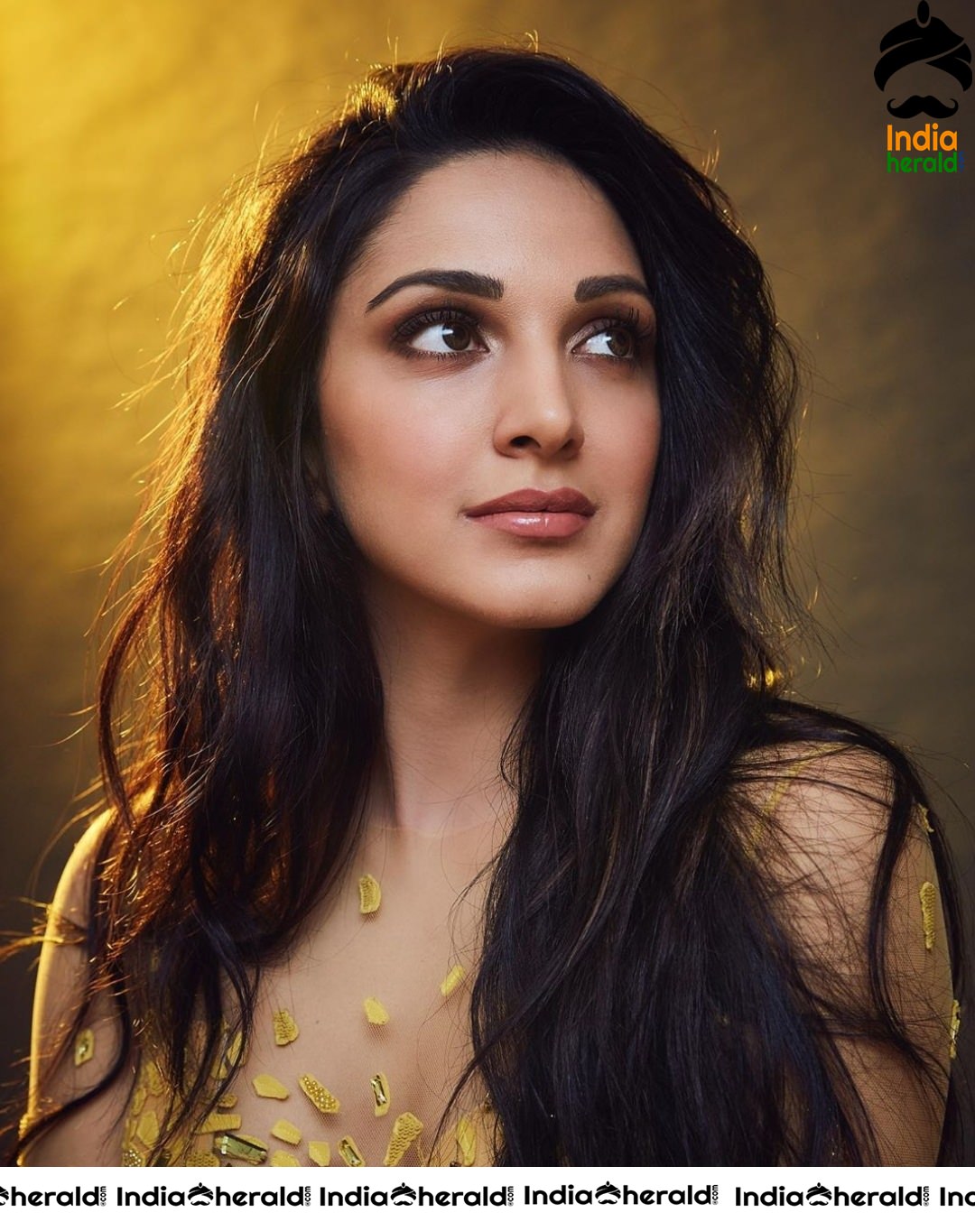 Kiara Advani Looks like a Golden Angel in this Photoshoot