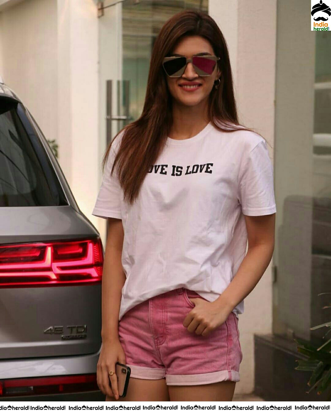 Kriti Sanon Charming In White Colour Top And Pink Colour Shorts
