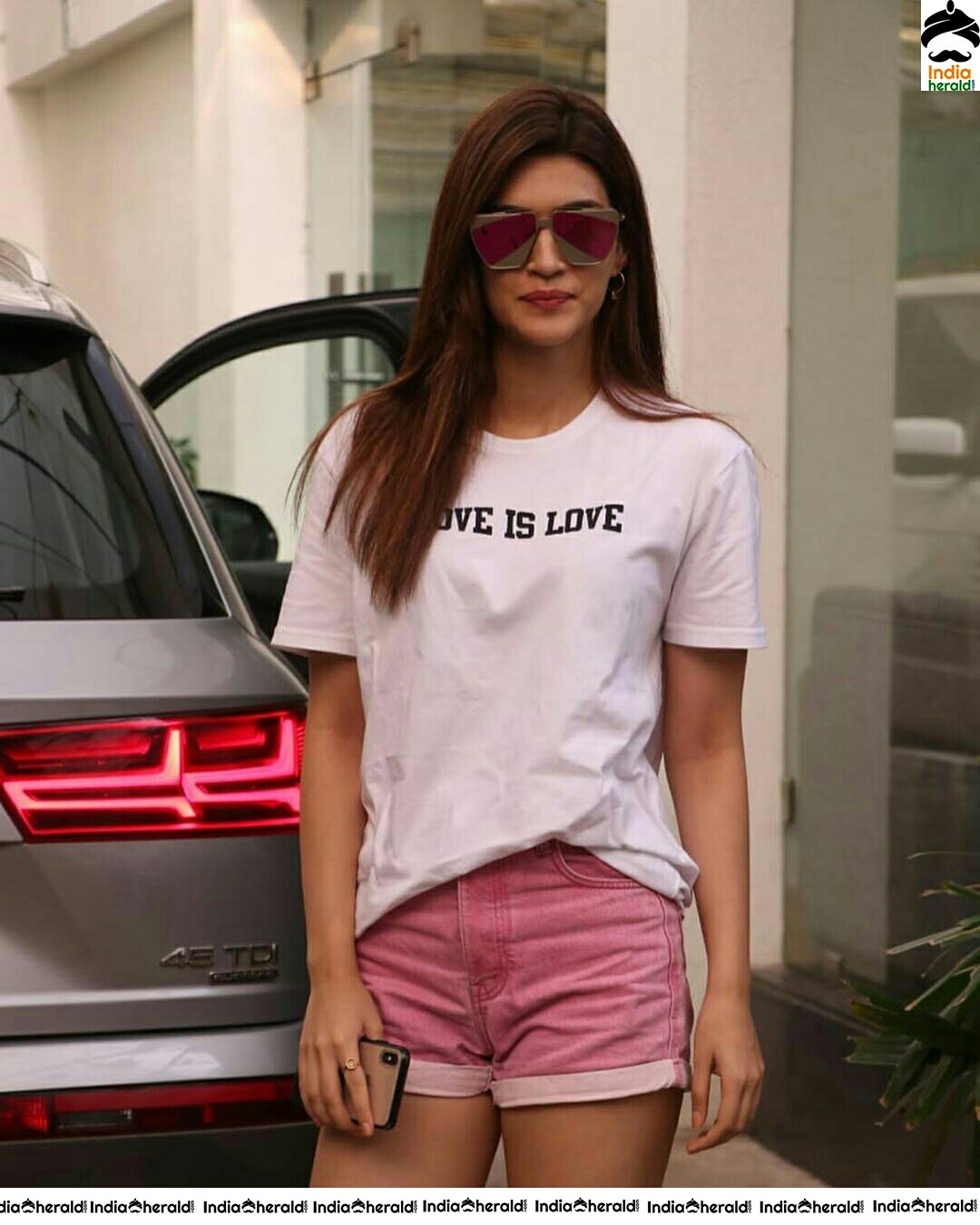 Kriti Sanon Charming In White Colour Top And Pink Colour Shorts
