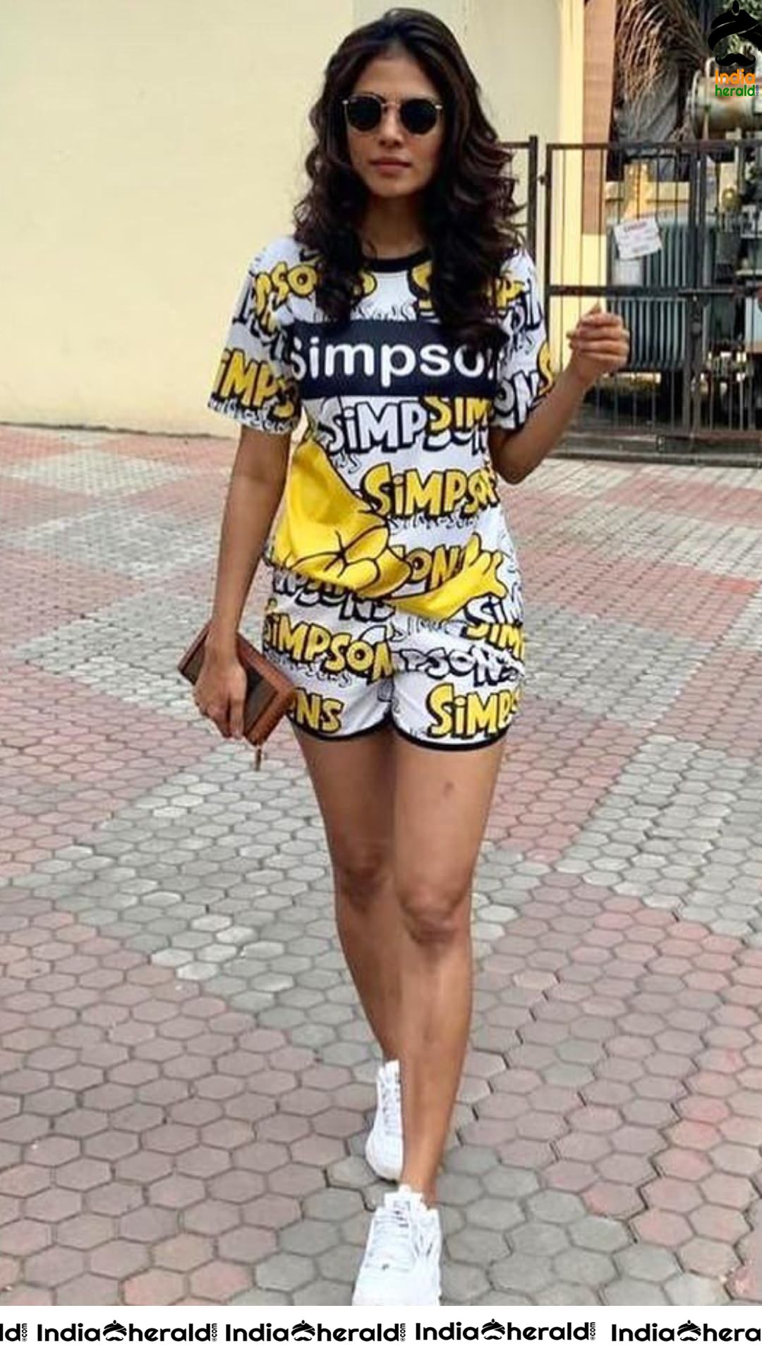 Latest Hot Clicks of Malavika Mohanan in Simpsons Dress exposing Slender Thighs