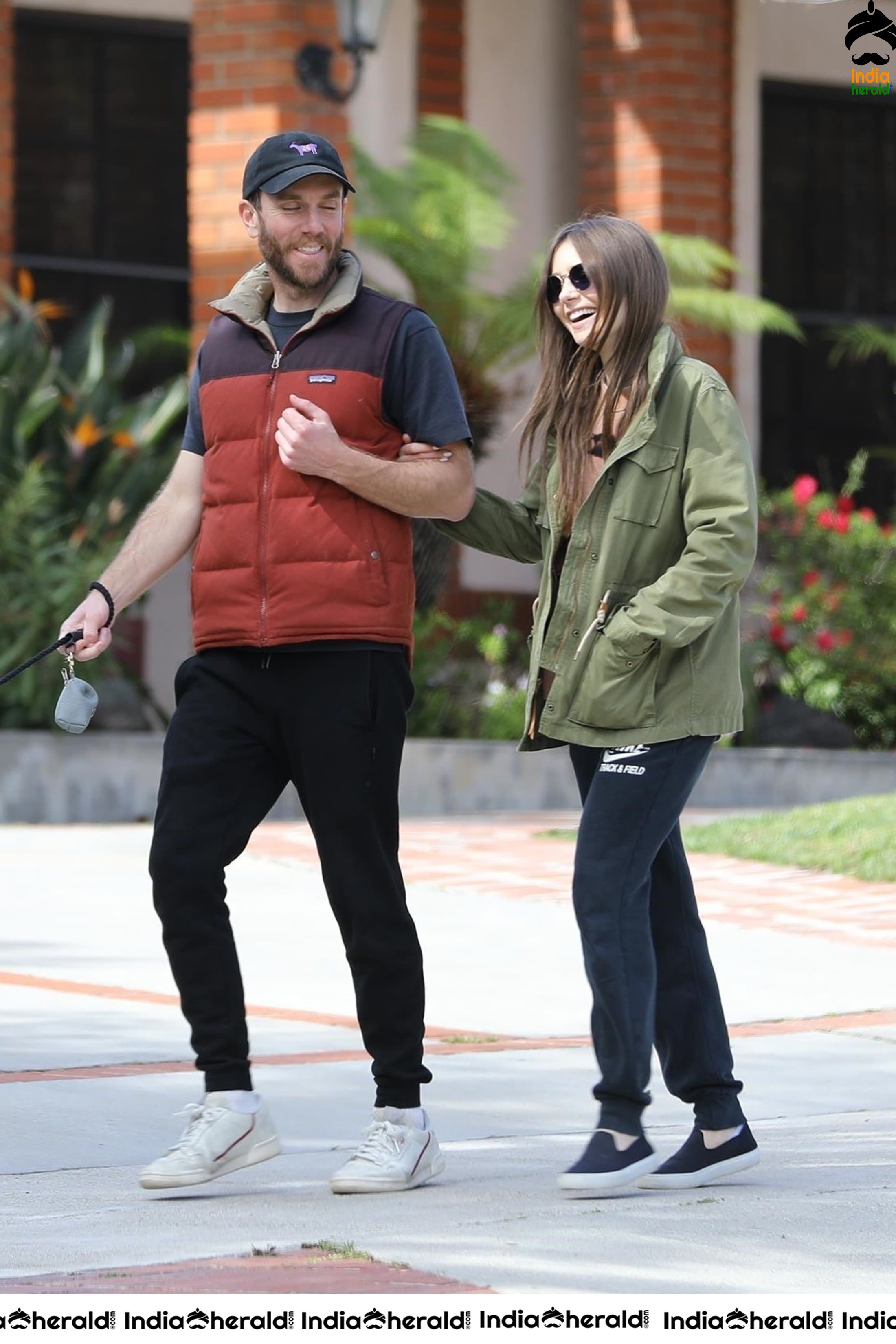 Lily Collins caught by Paparazzi while walking with her dog in Los Angeles