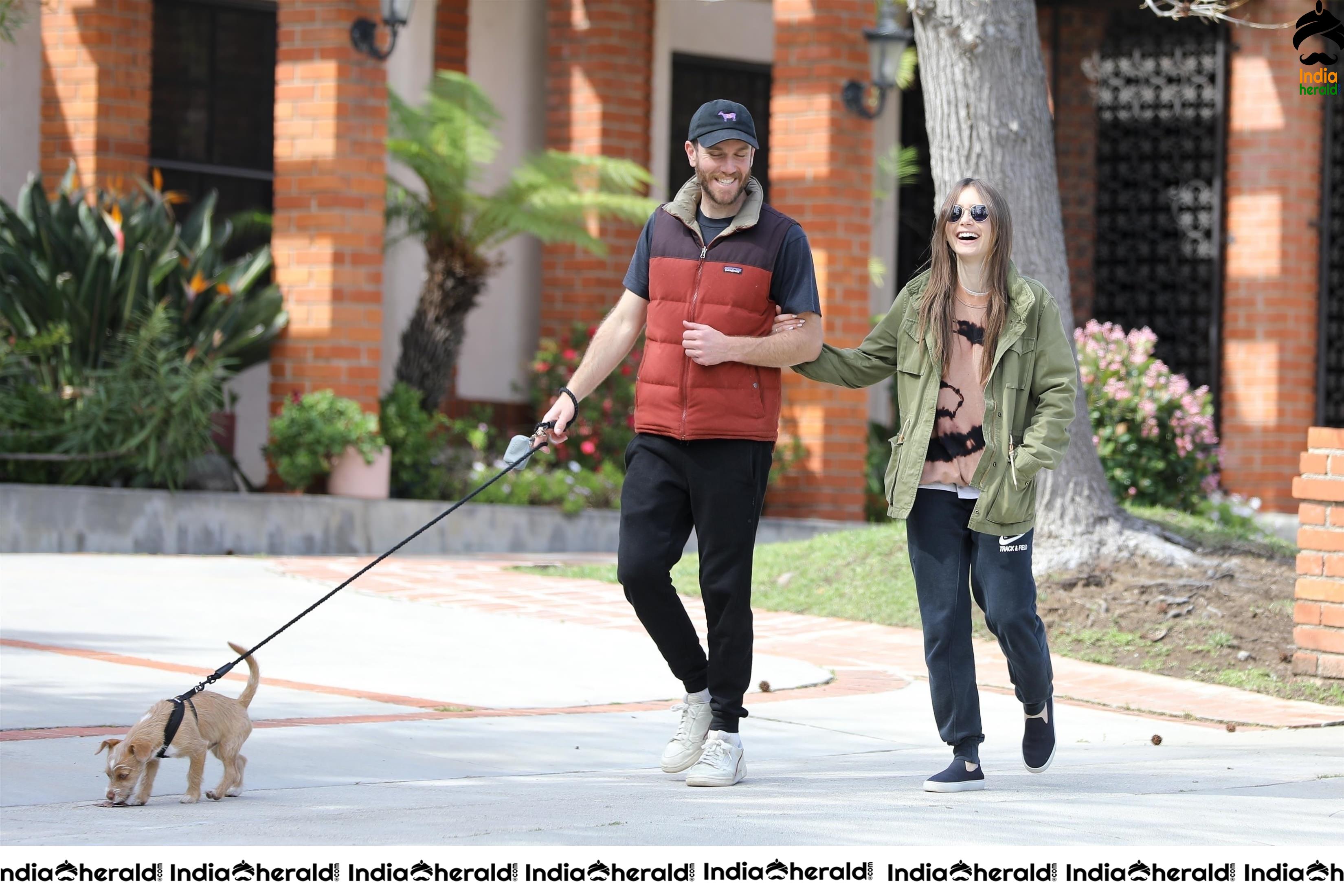 Lily Collins caught by Paparazzi while walking with her dog in Los Angeles