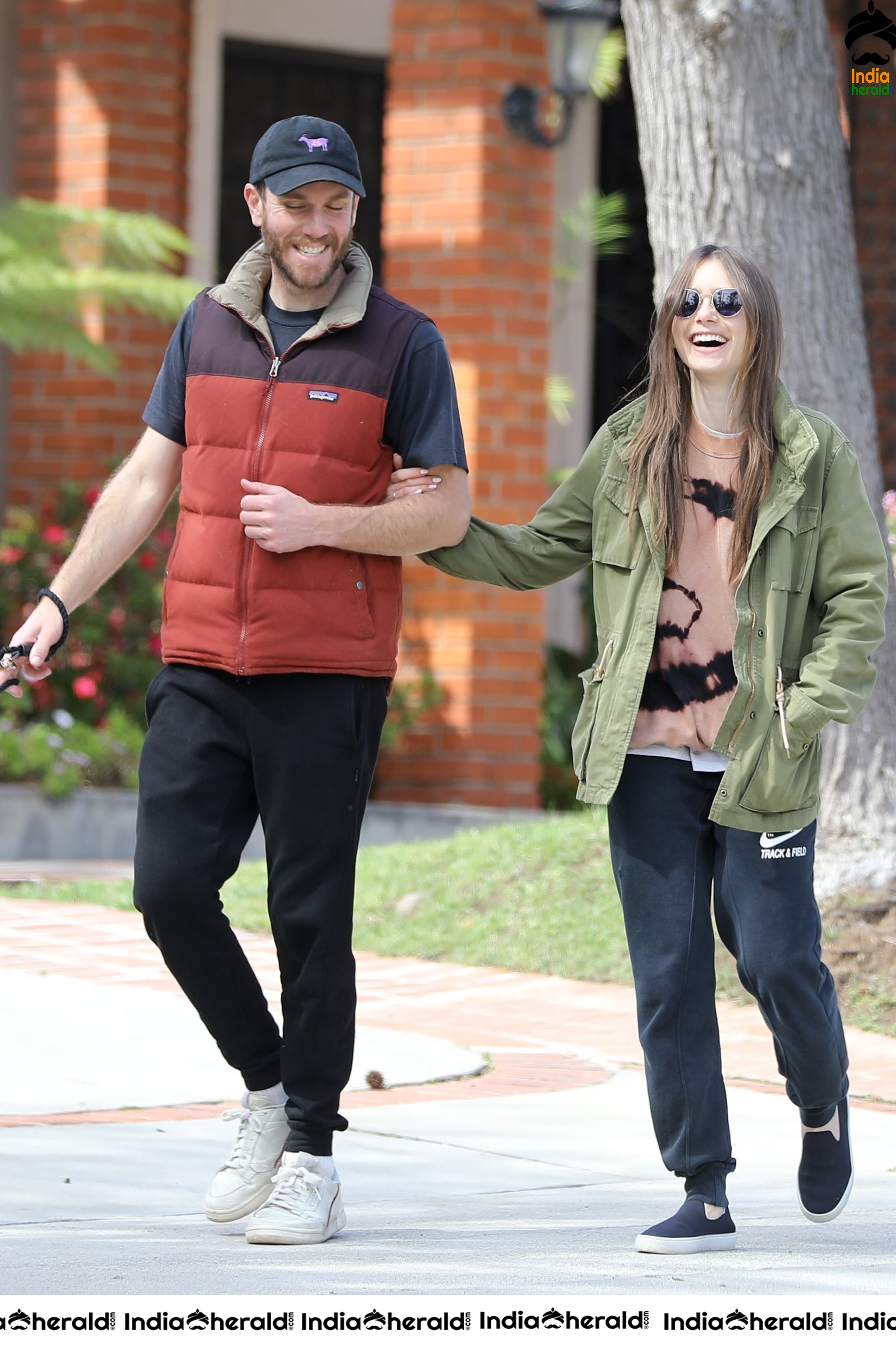 Lily Collins caught by Paparazzi while walking with her dog in Los Angeles