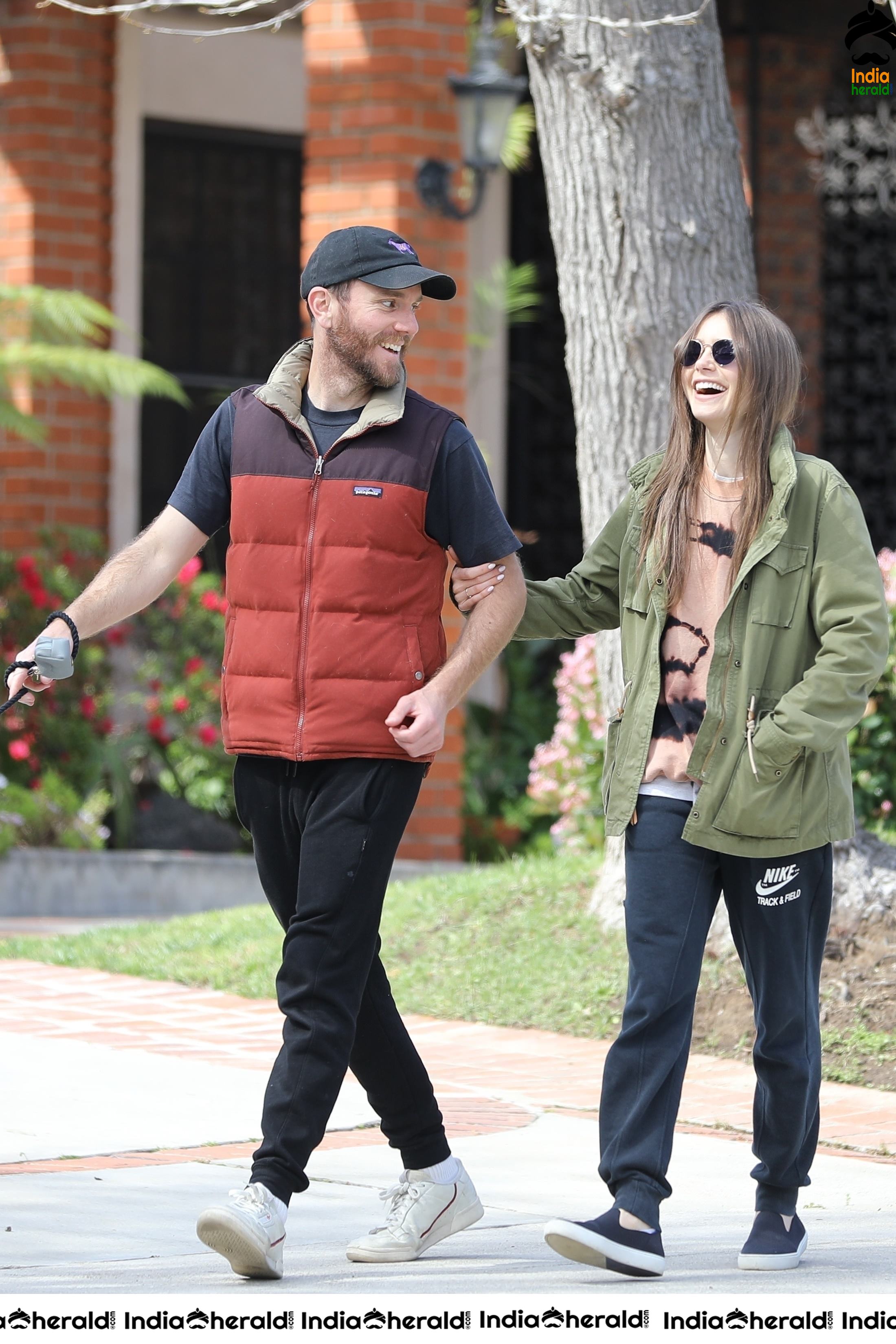 Lily Collins caught by Paparazzi while walking with her dog in Los Angeles