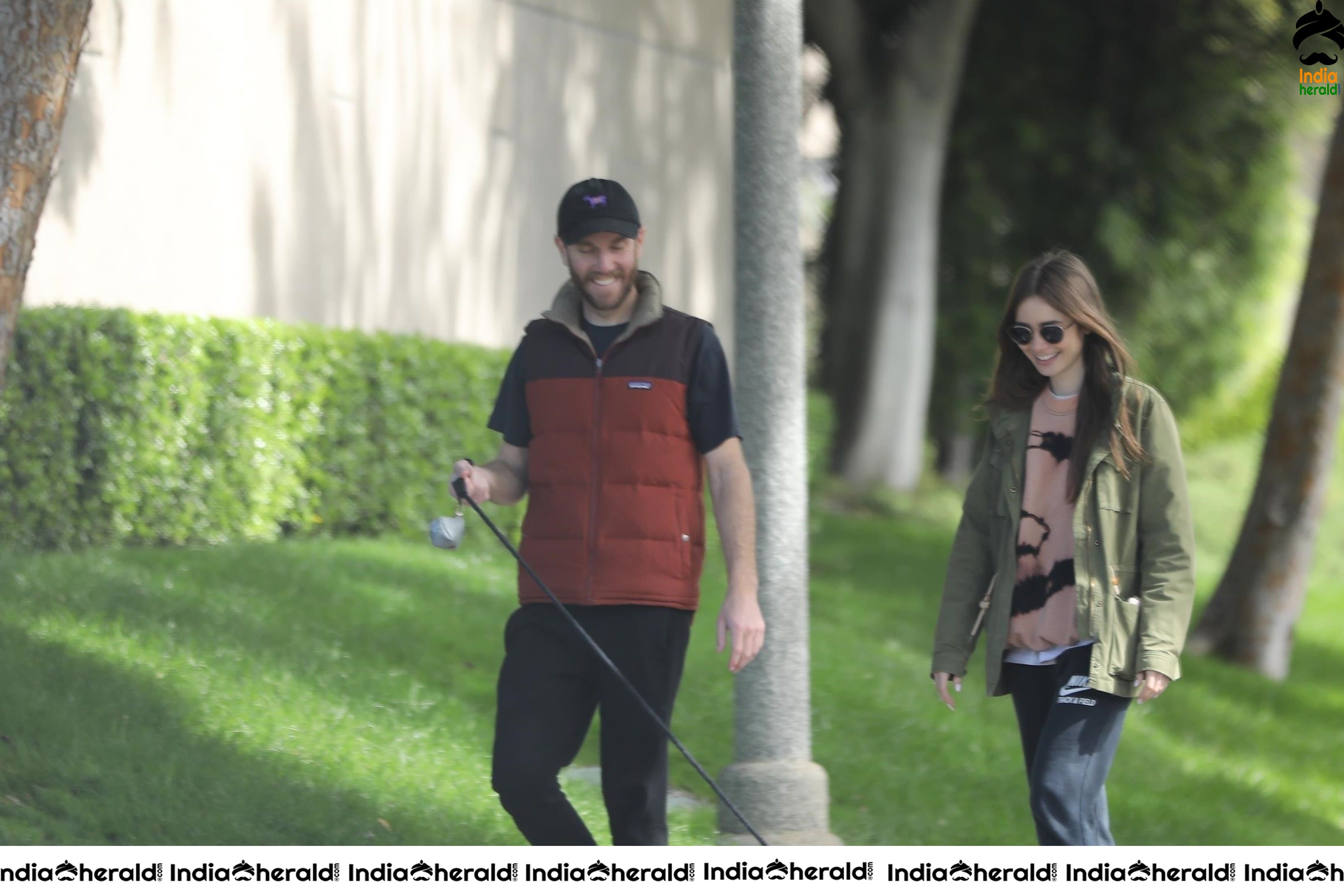 Lily Collins caught by Paparazzi while walking with her dog in Los Angeles