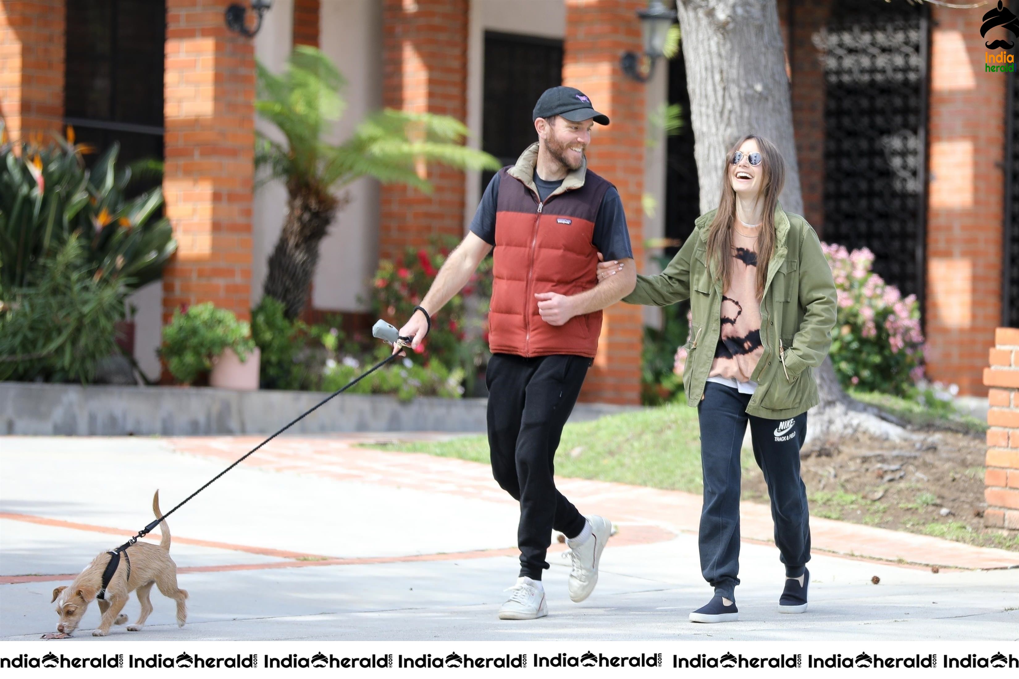 Lily Collins caught by Paparazzi while walking with her dog in Los Angeles