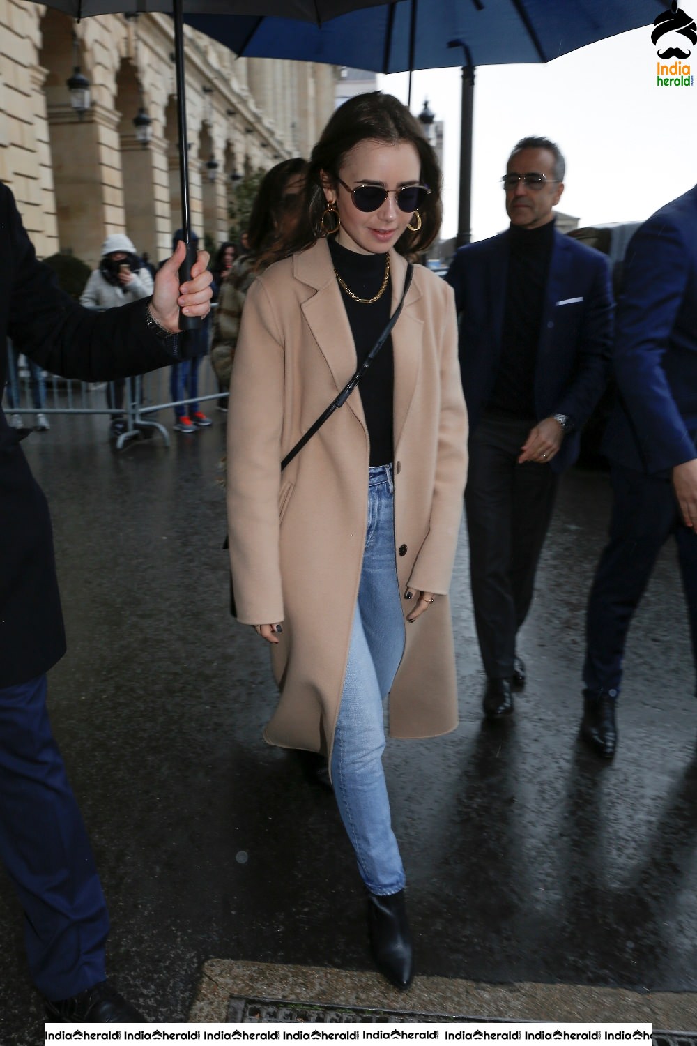 Lily Collins leaving her hotel in Paris France