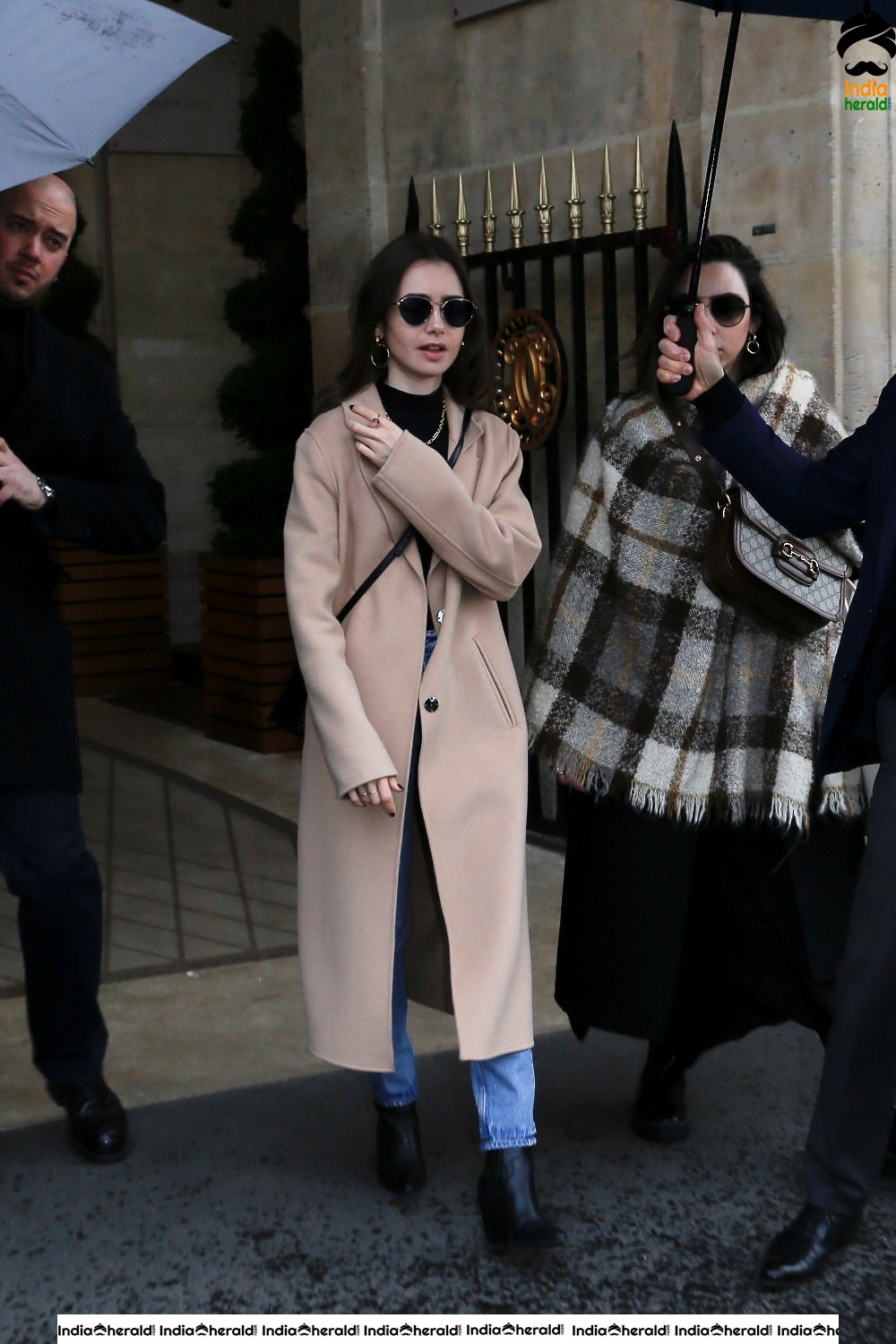 Lily Collins leaving her hotel in Paris France