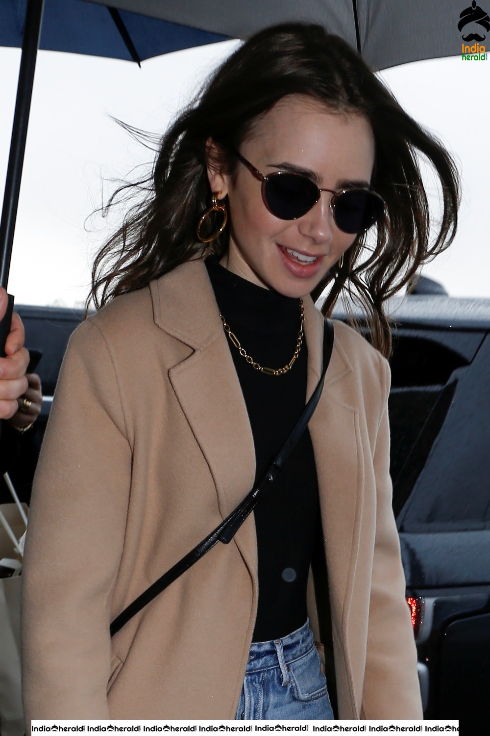 Lily Collins leaving her hotel in Paris France