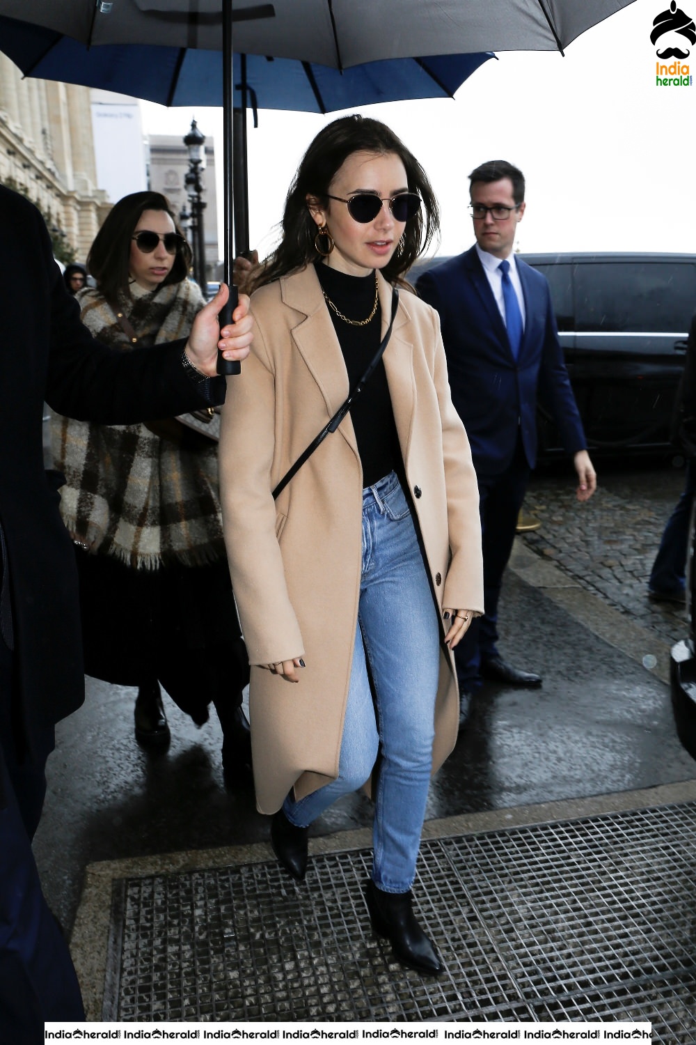 Lily Collins leaving her hotel in Paris France