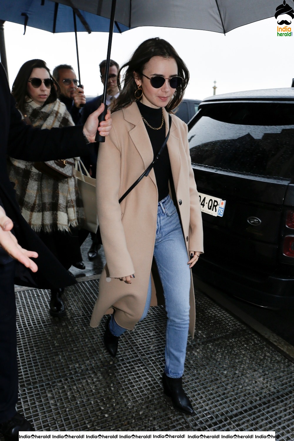 Lily Collins leaving her hotel in Paris France
