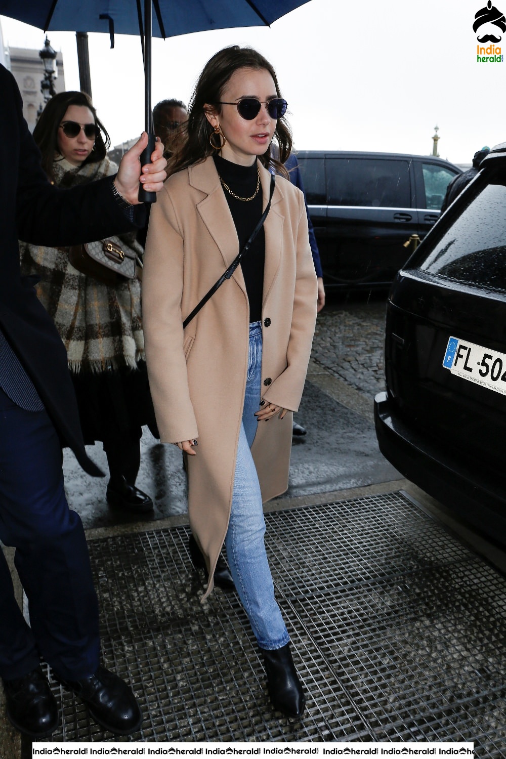 Lily Collins leaving her hotel in Paris France