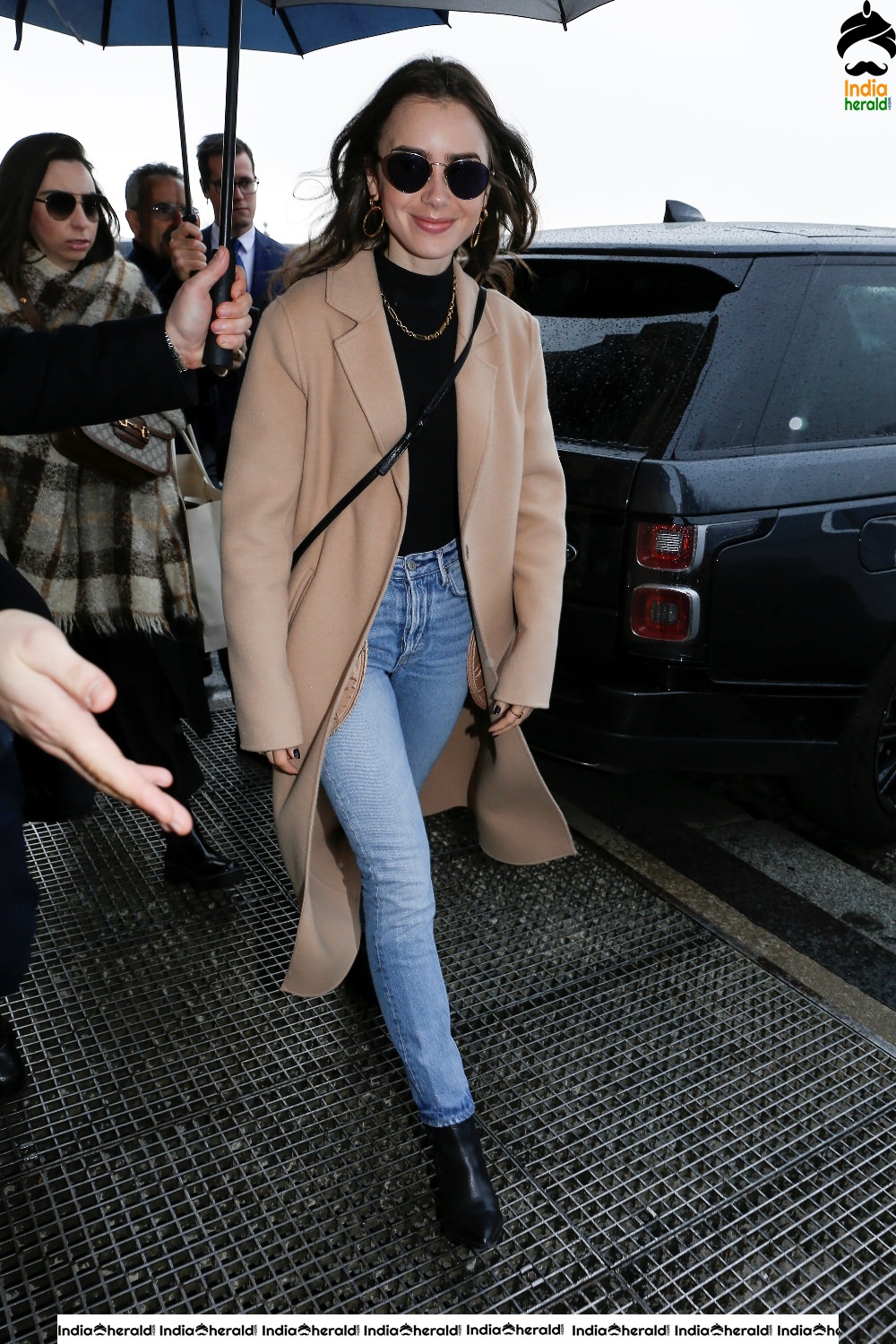 Lily Collins leaving her hotel in Paris France