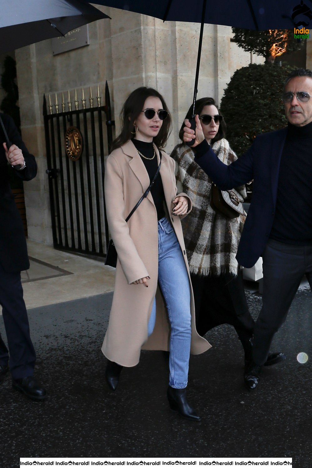 Lily Collins leaving her hotel in Paris France
