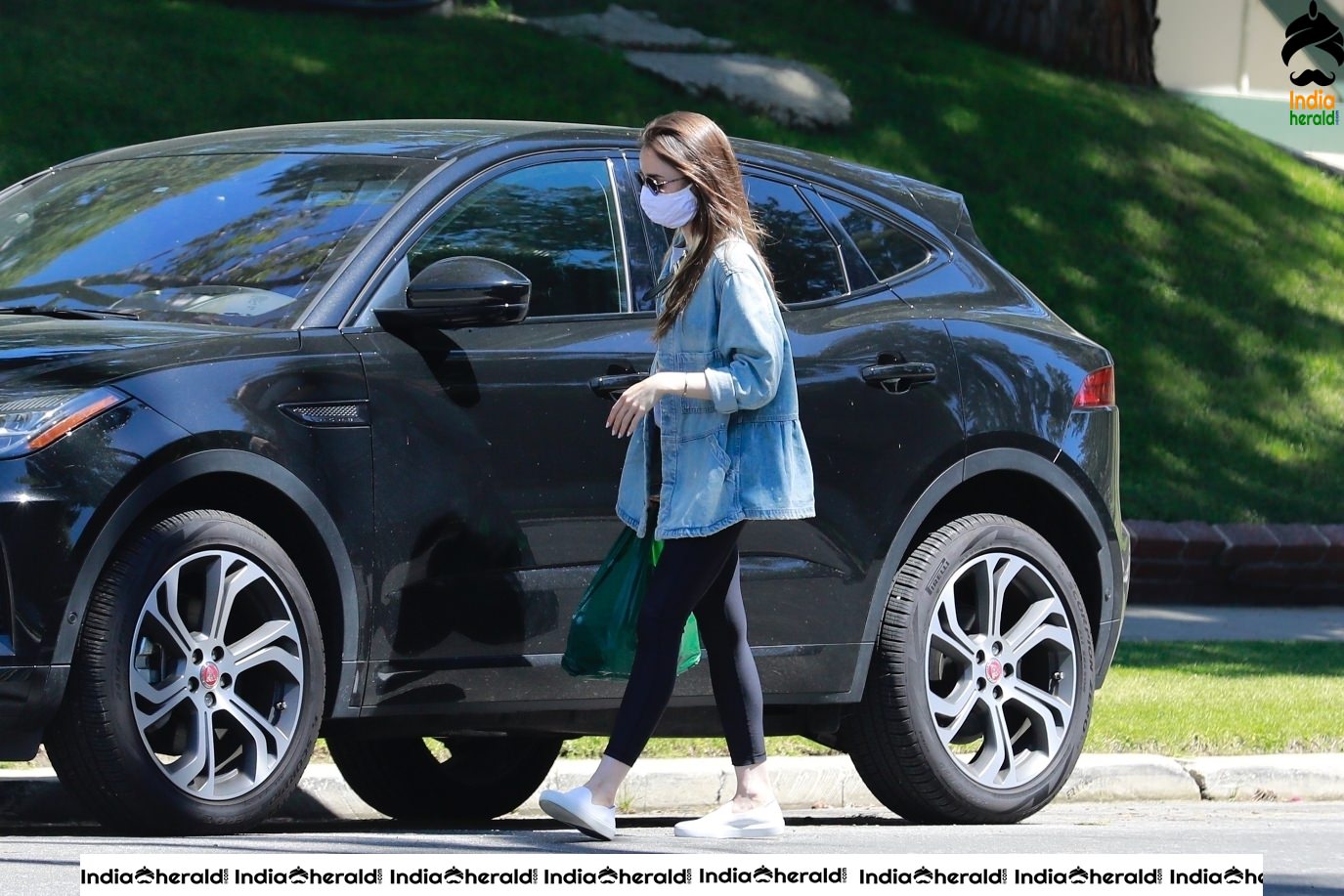 Lily Collins outside a family members house in Los Angeles