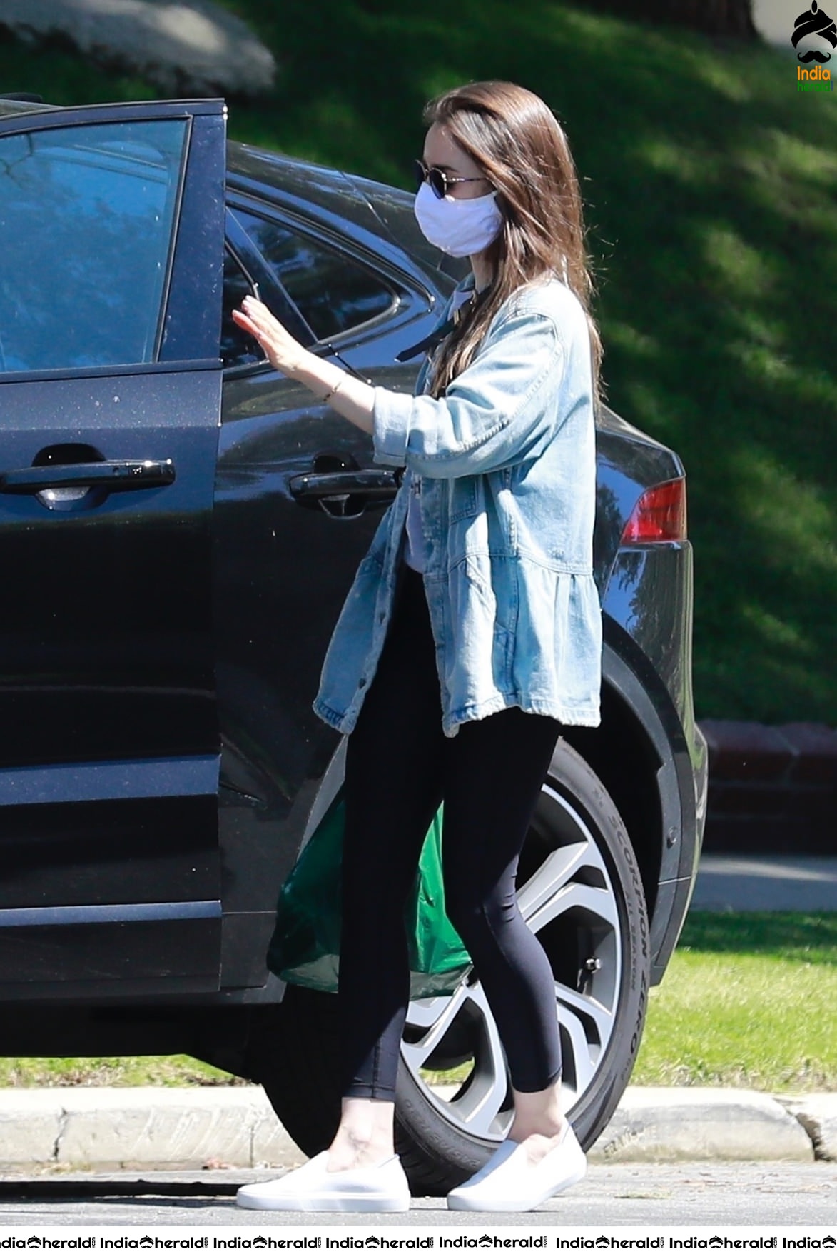 Lily Collins outside a family members house in Los Angeles