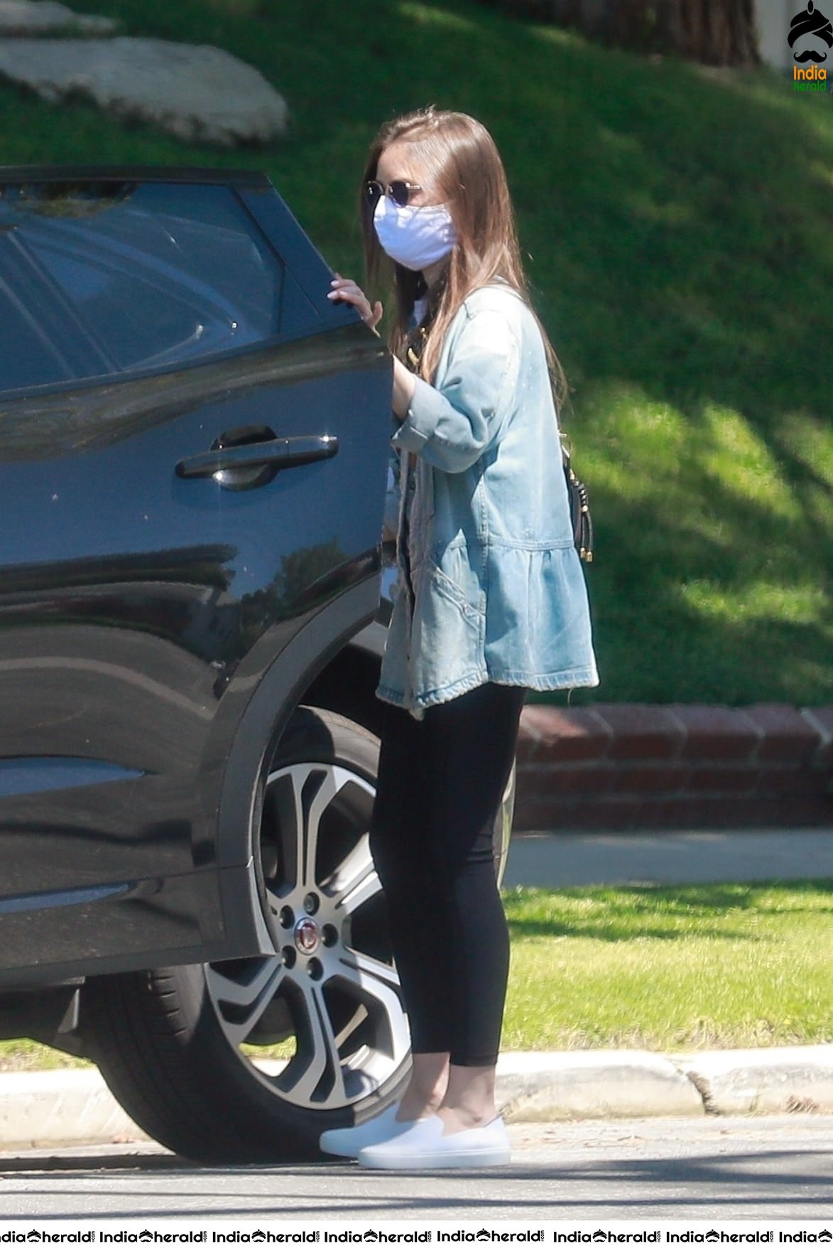 Lily Collins outside a family members house in Los Angeles