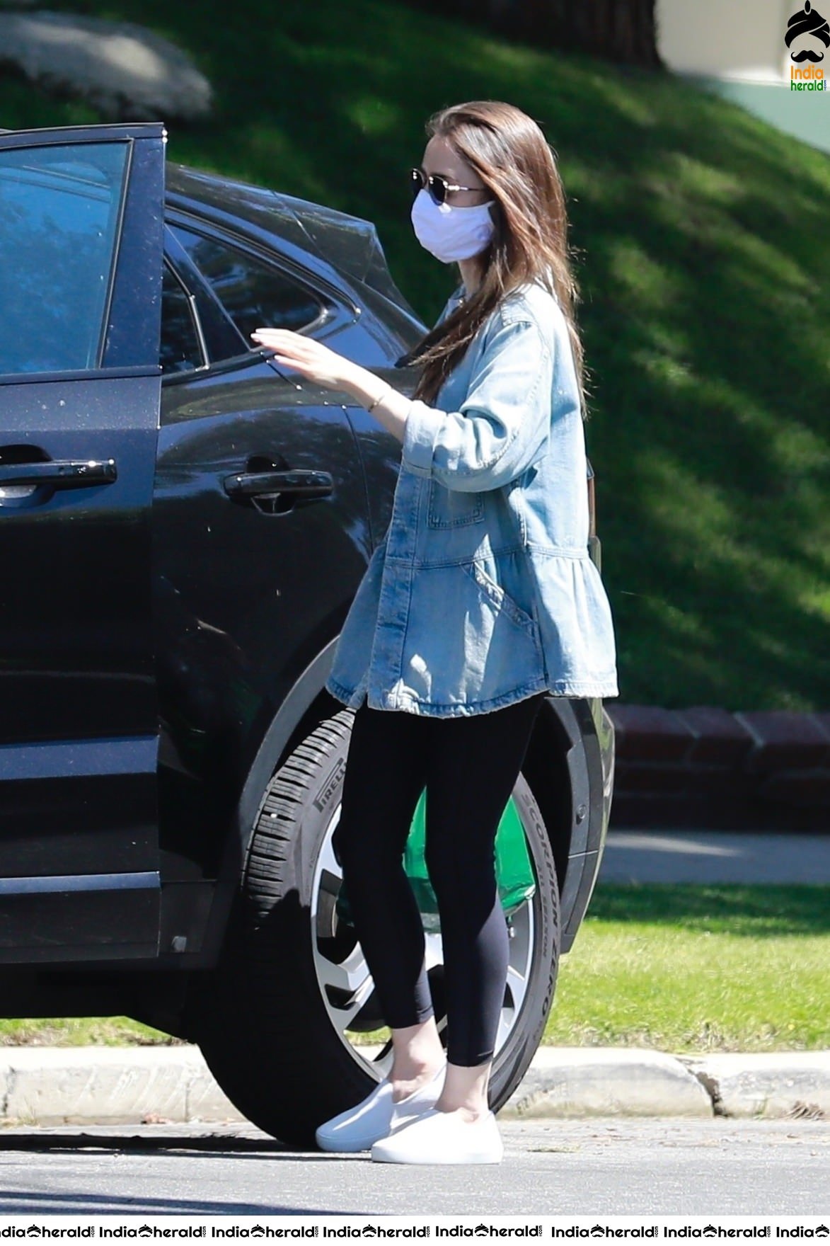 Lily Collins outside a family members house in Los Angeles