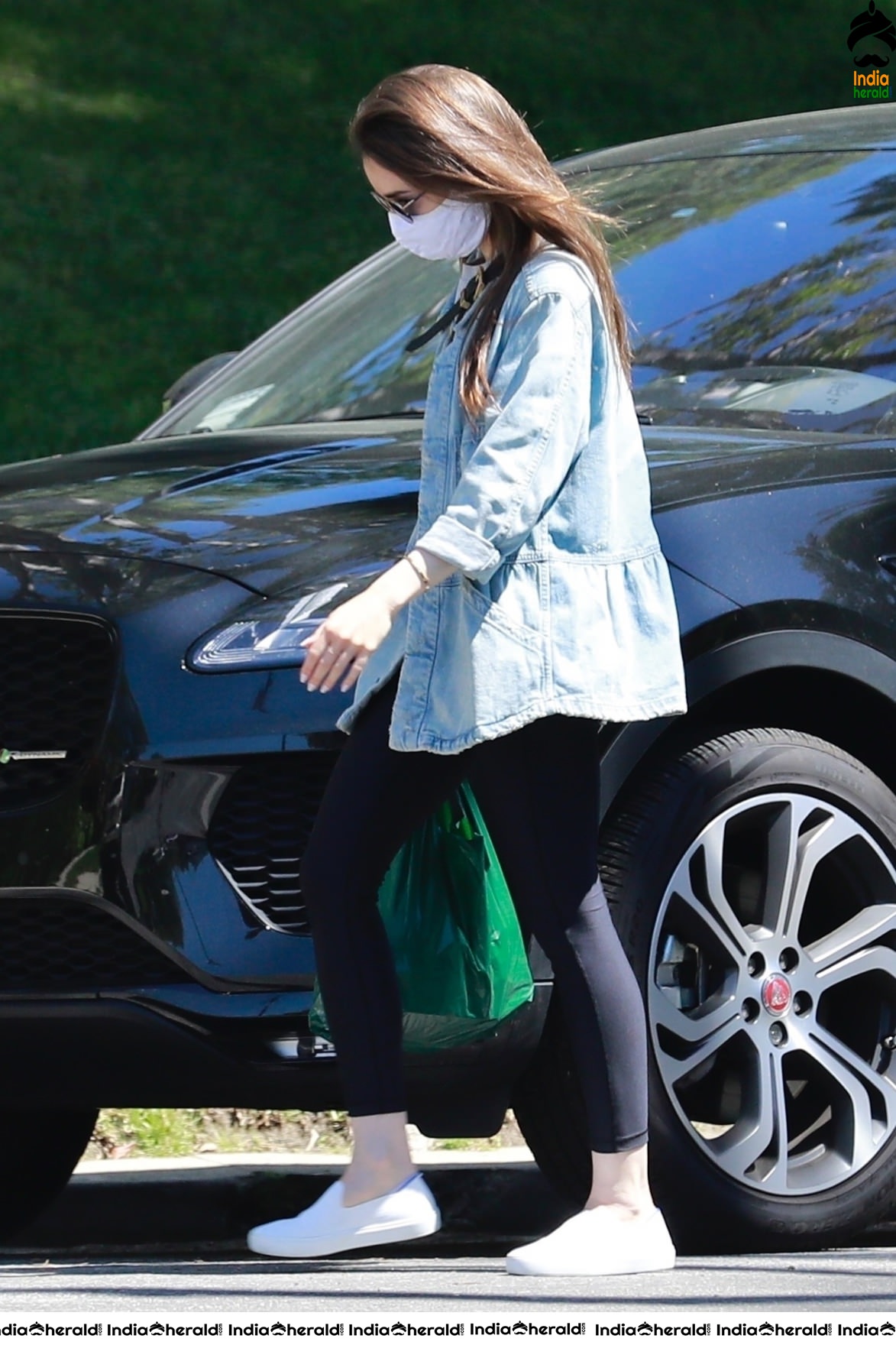 Lily Collins outside a family members house in Los Angeles