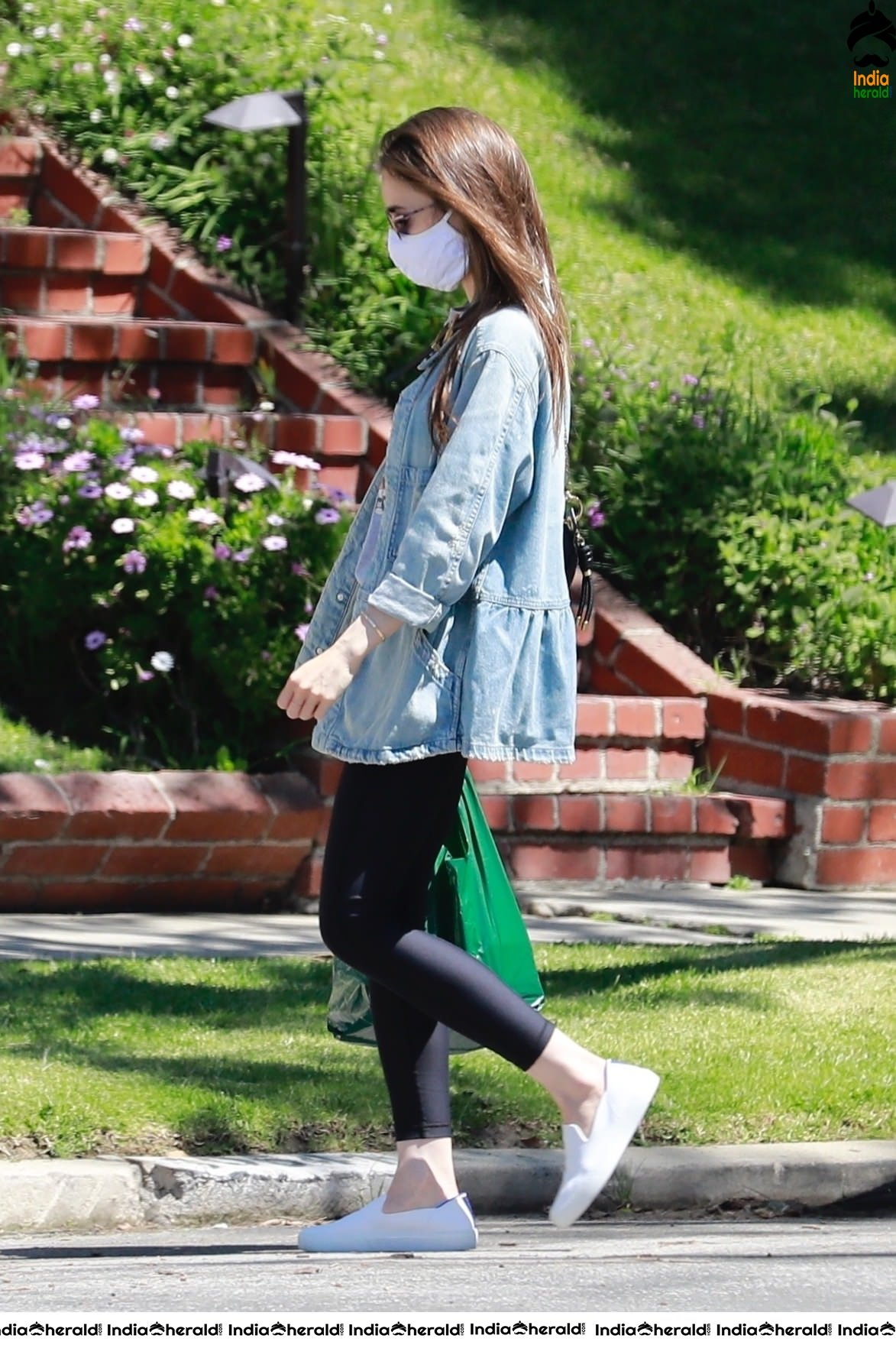 Lily Collins outside a family members house in Los Angeles