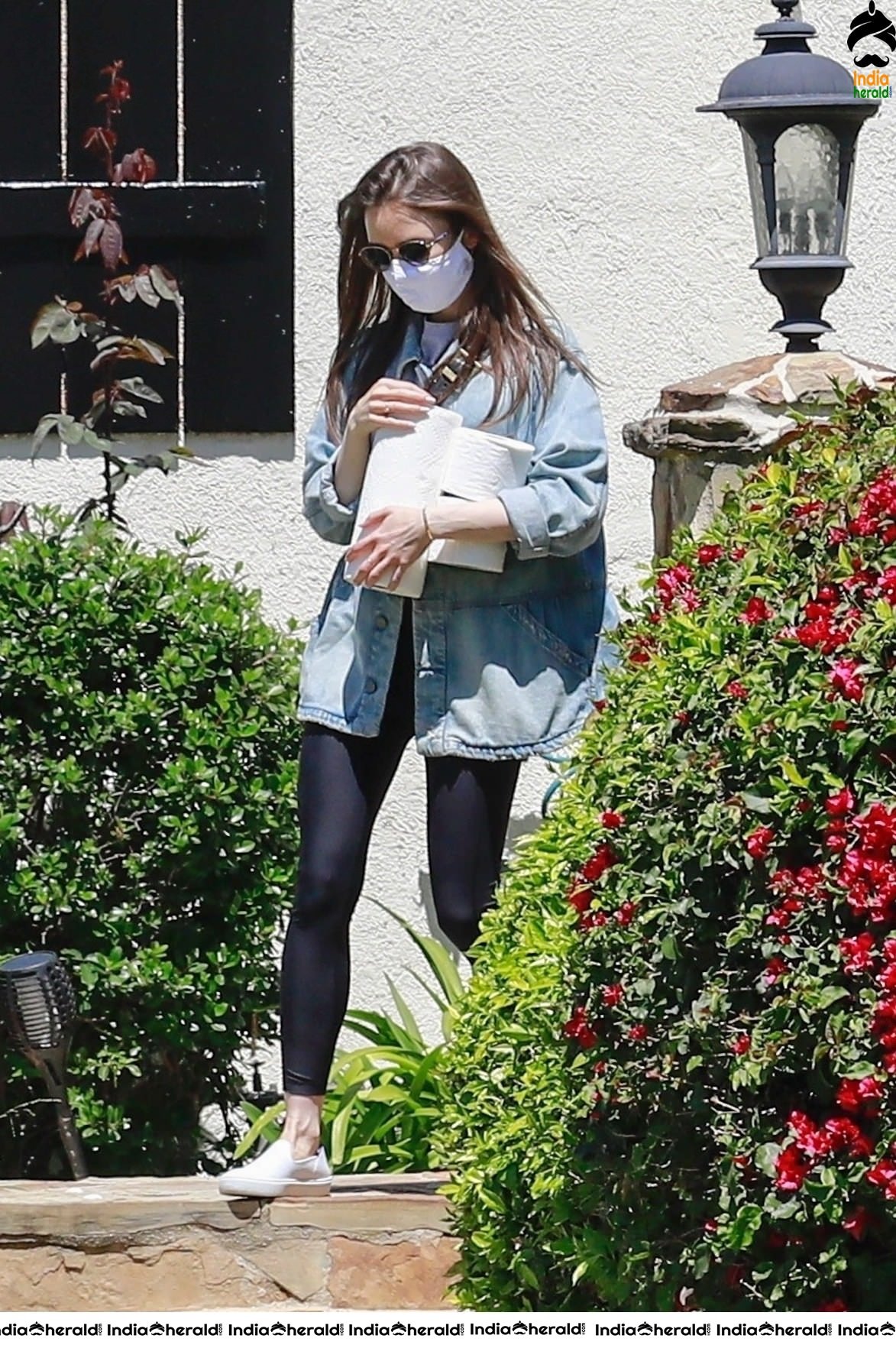 Lily Collins outside a family members house in Los Angeles