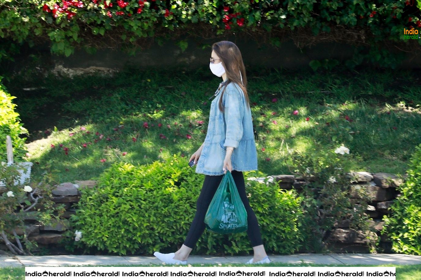Lily Collins outside a family members house in Los Angeles