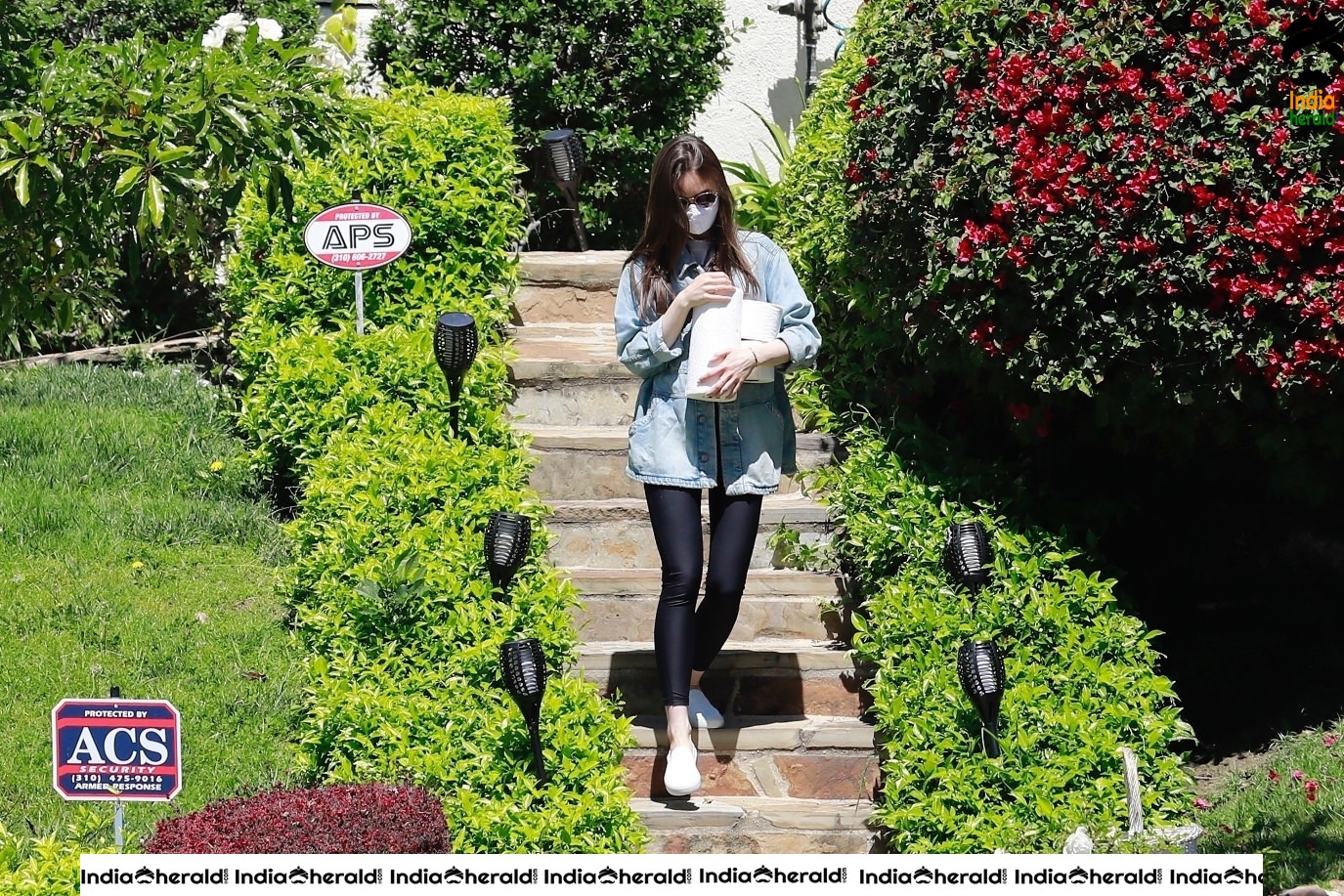 Lily Collins outside a family members house in Los Angeles