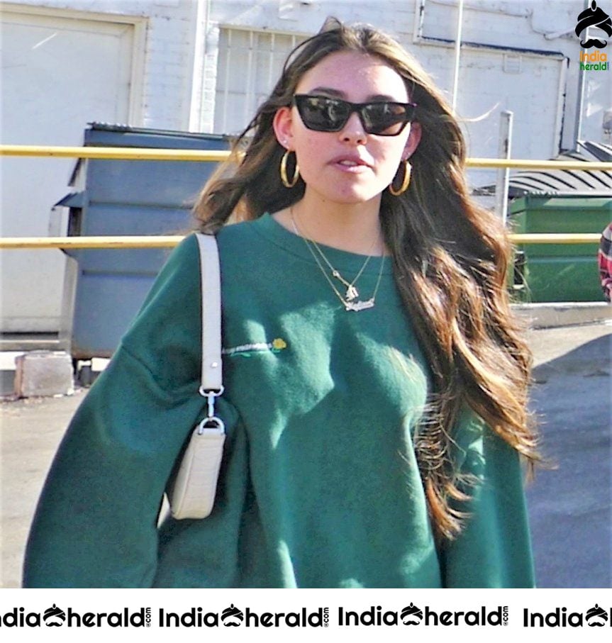 Madison Beer caught by Paparazzi while leaving Croft Alley in Beverly Hills