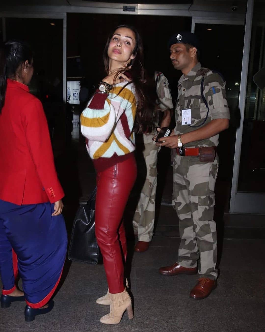 Malaika Arora Spotted In Juhu Wearing Maroon Spandex