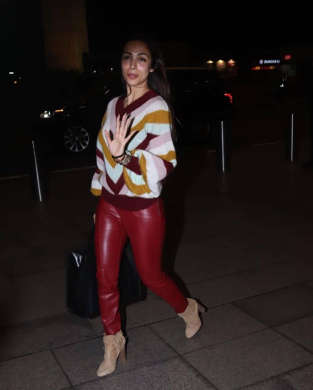 Malaika Arora Spotted In Juhu Wearing Maroon Spandex