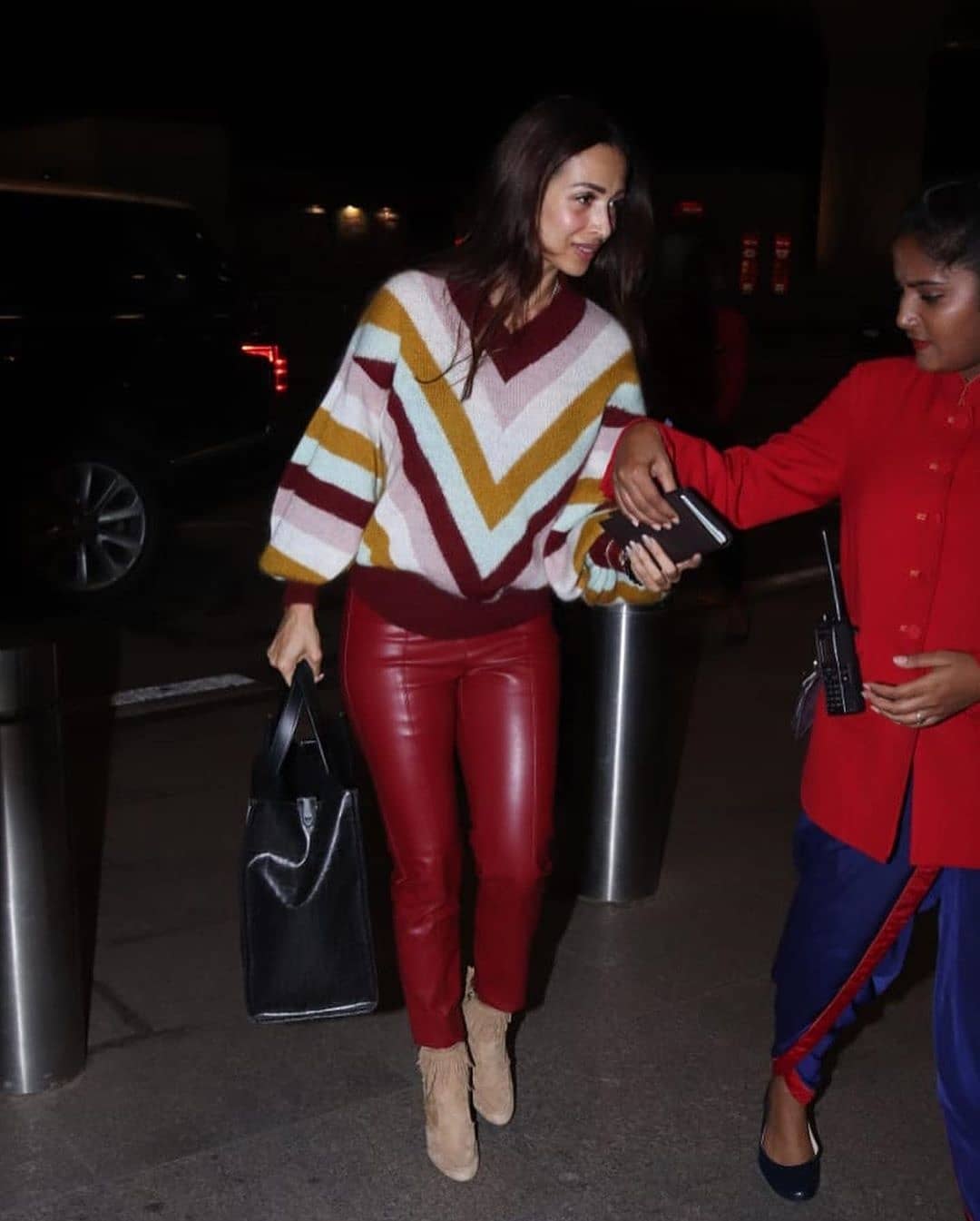Malaika Arora Spotted In Juhu Wearing Maroon Spandex