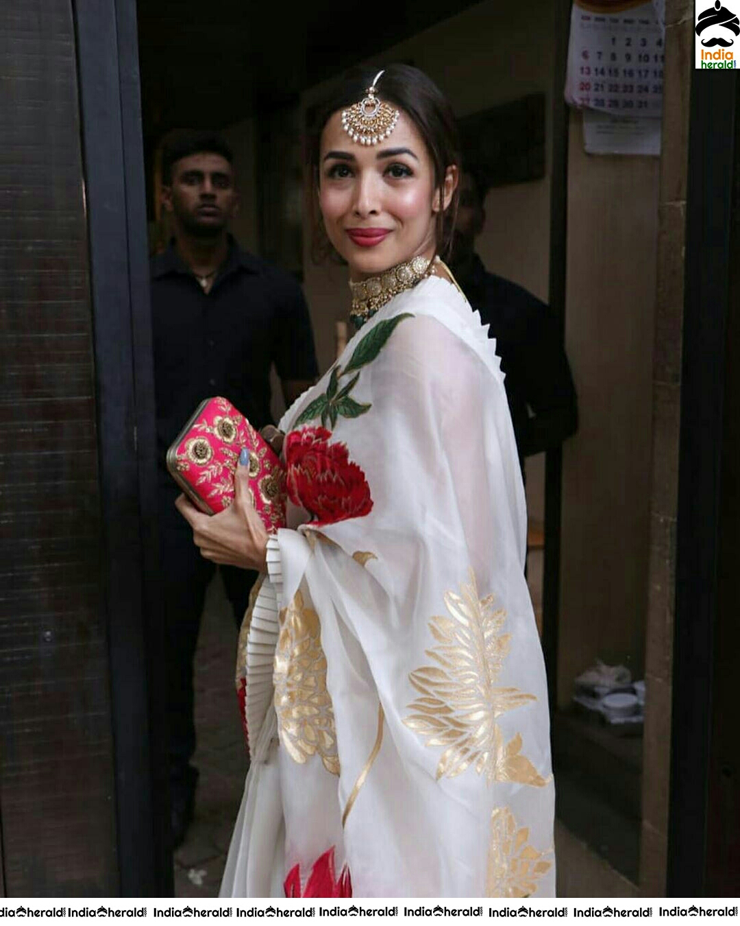 Malaika Beautiful In White Saree Photo Stills