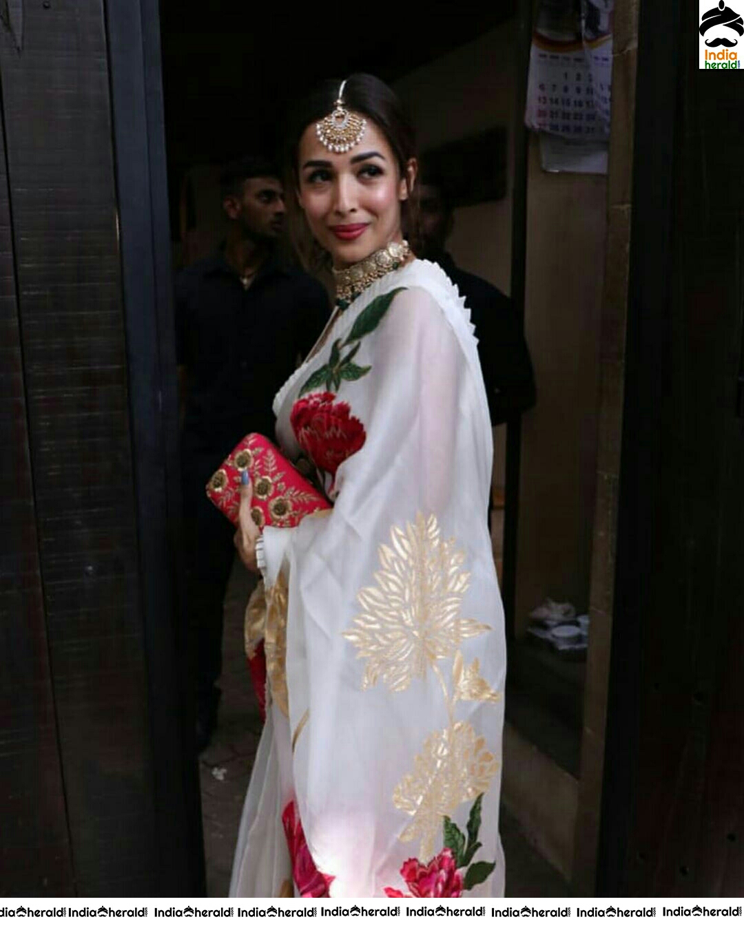 Malaika Beautiful In White Saree Photo Stills