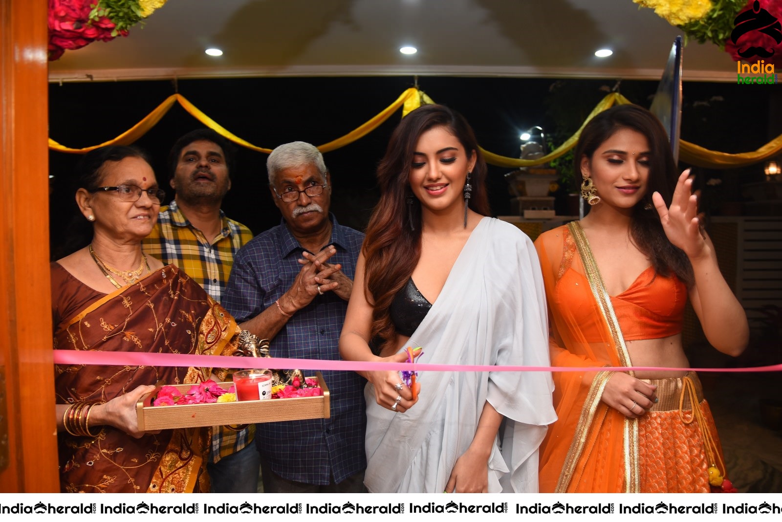 Malvika Sharma Seen in a Sexy Saree at the Ribbon Cutting moment Set 1