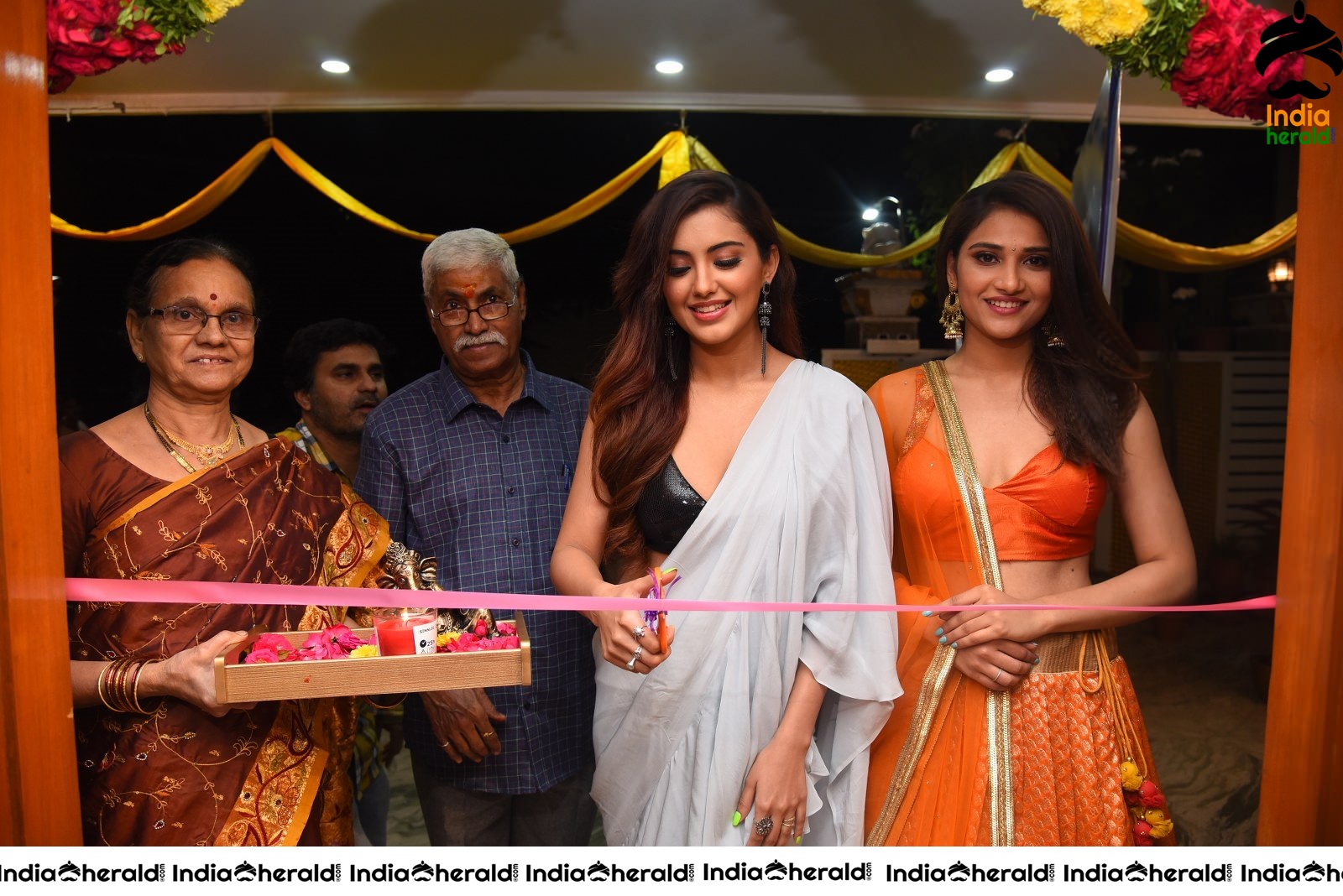 Malvika Sharma Seen in a Sexy Saree at the Ribbon Cutting moment Set 1