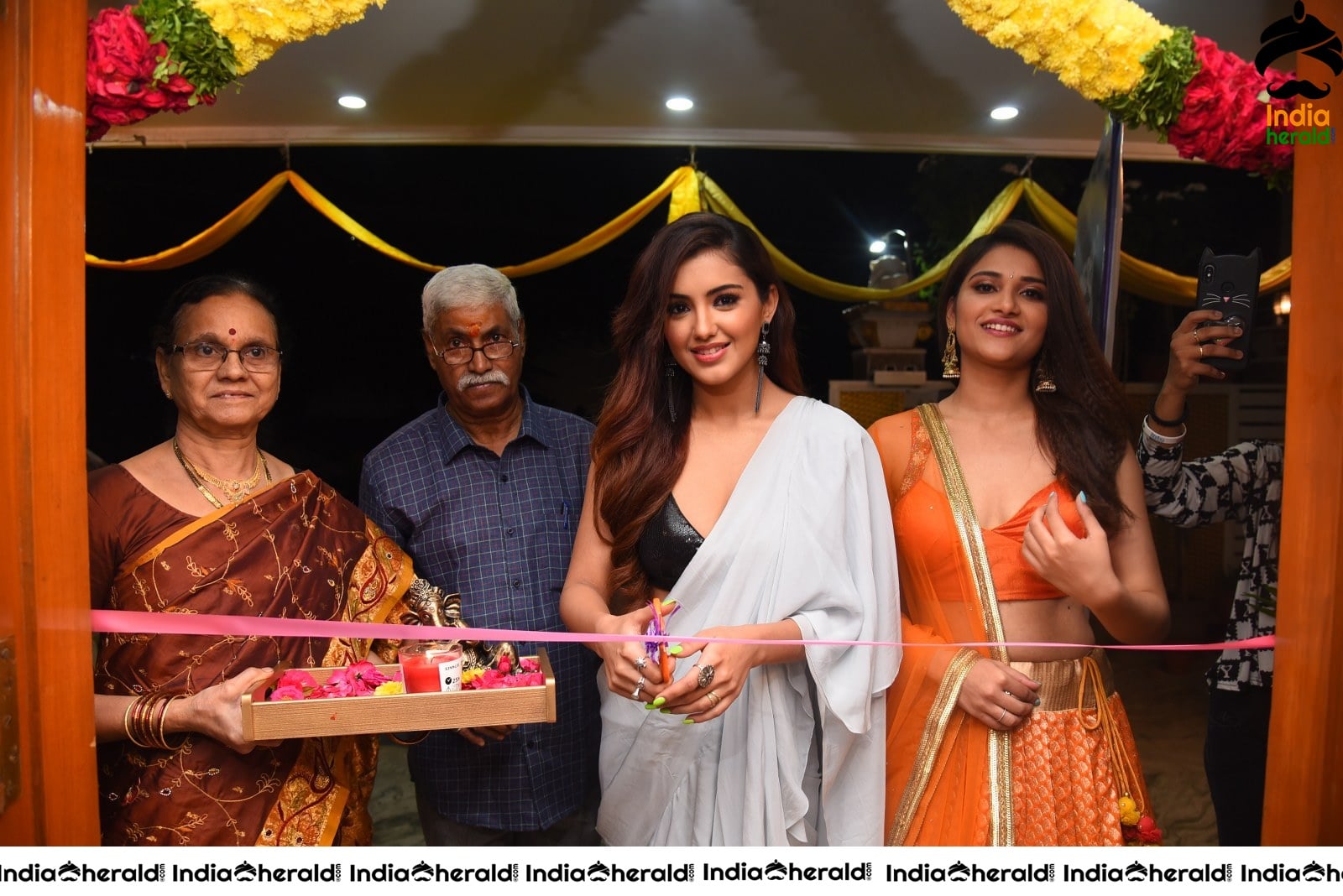 Malvika Sharma Seen in a Sexy Saree at the Ribbon Cutting moment Set 2