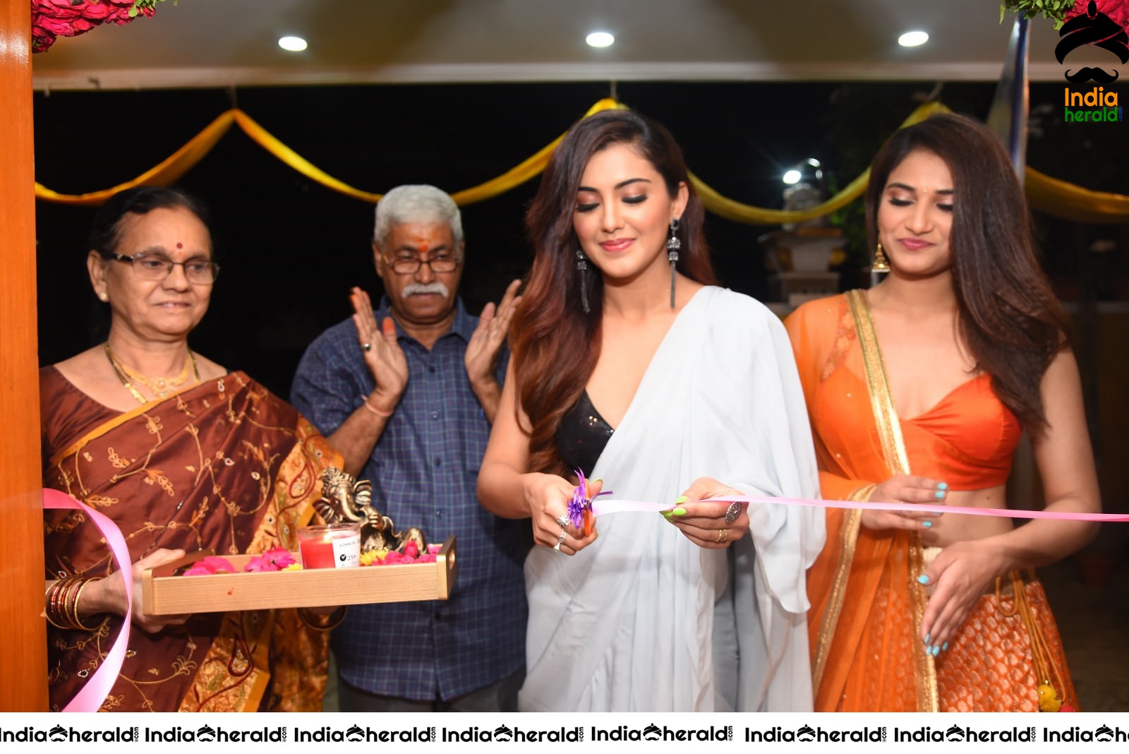 Malvika Sharma Seen in a Sexy Saree at the Ribbon Cutting moment Set 2