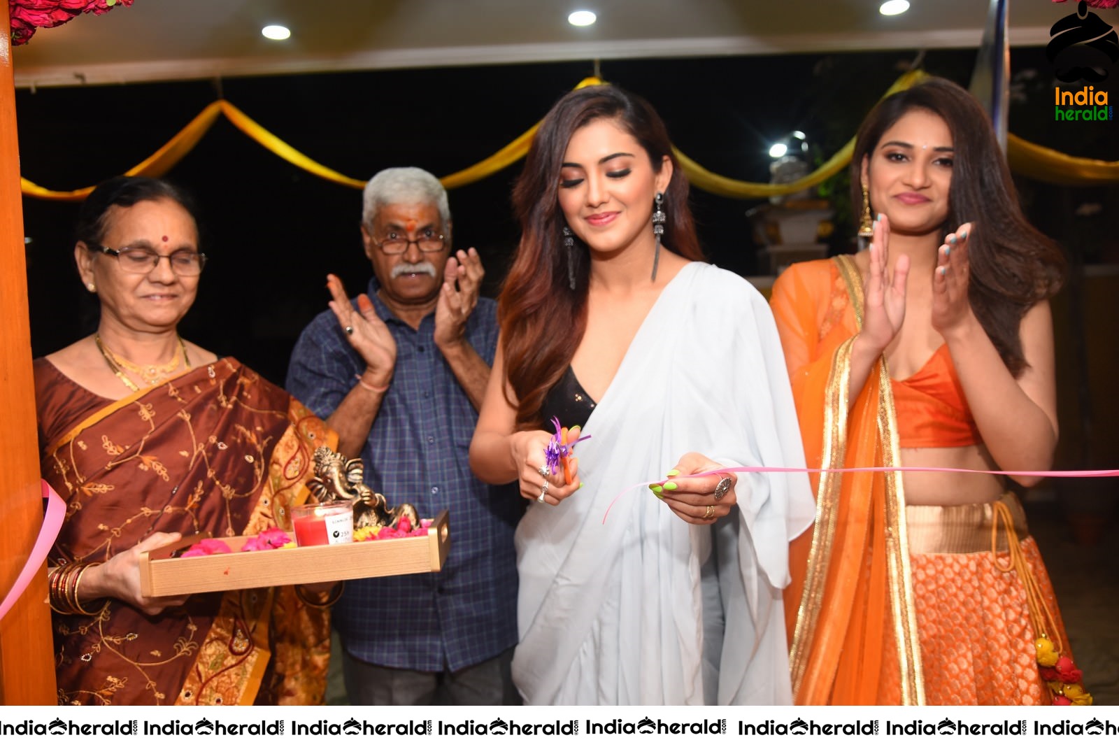 Malvika Sharma Seen in a Sexy Saree at the Ribbon Cutting moment Set 2
