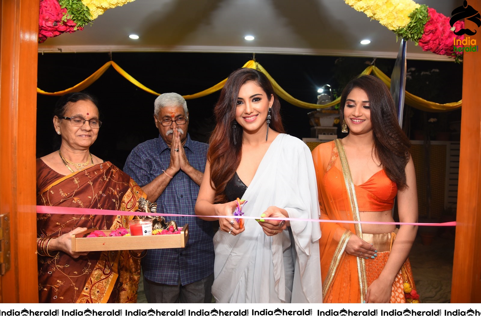 Malvika Sharma Seen in a Sexy Saree at the Ribbon Cutting moment Set 2