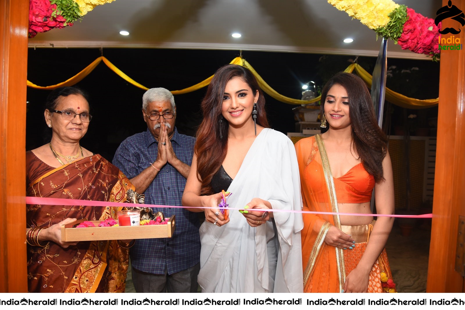 Malvika Sharma Seen in a Sexy Saree at the Ribbon Cutting moment Set 2
