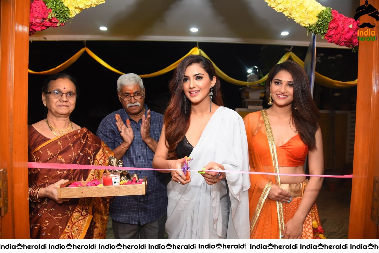 Malvika Sharma Seen in a Sexy Saree at the Ribbon Cutting moment Set 2
