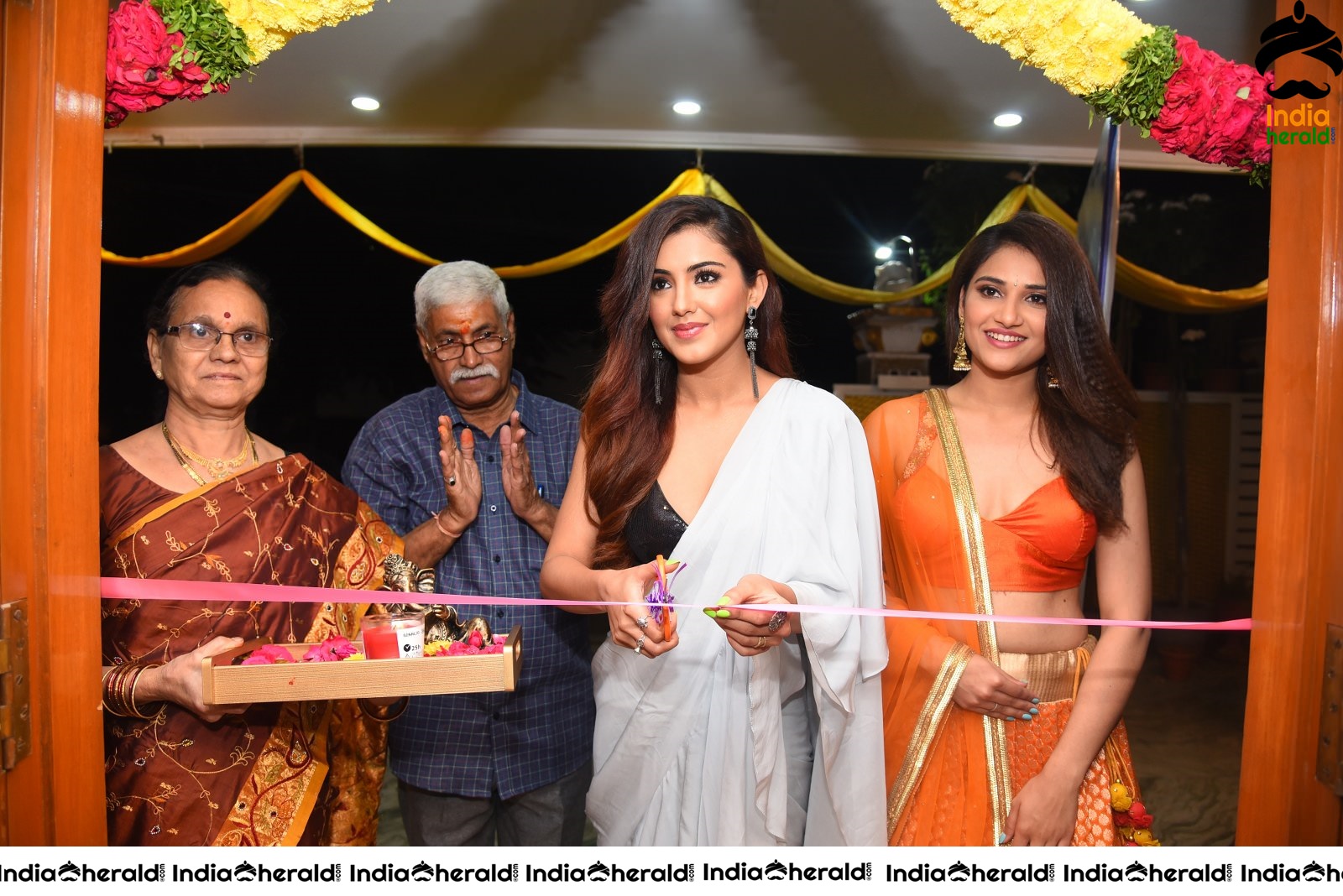 Malvika Sharma Seen in a Sexy Saree at the Ribbon Cutting moment Set 2