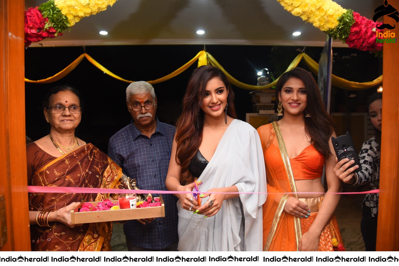 Malvika Sharma Seen in a Sexy Saree at the Ribbon Cutting moment Set 2
