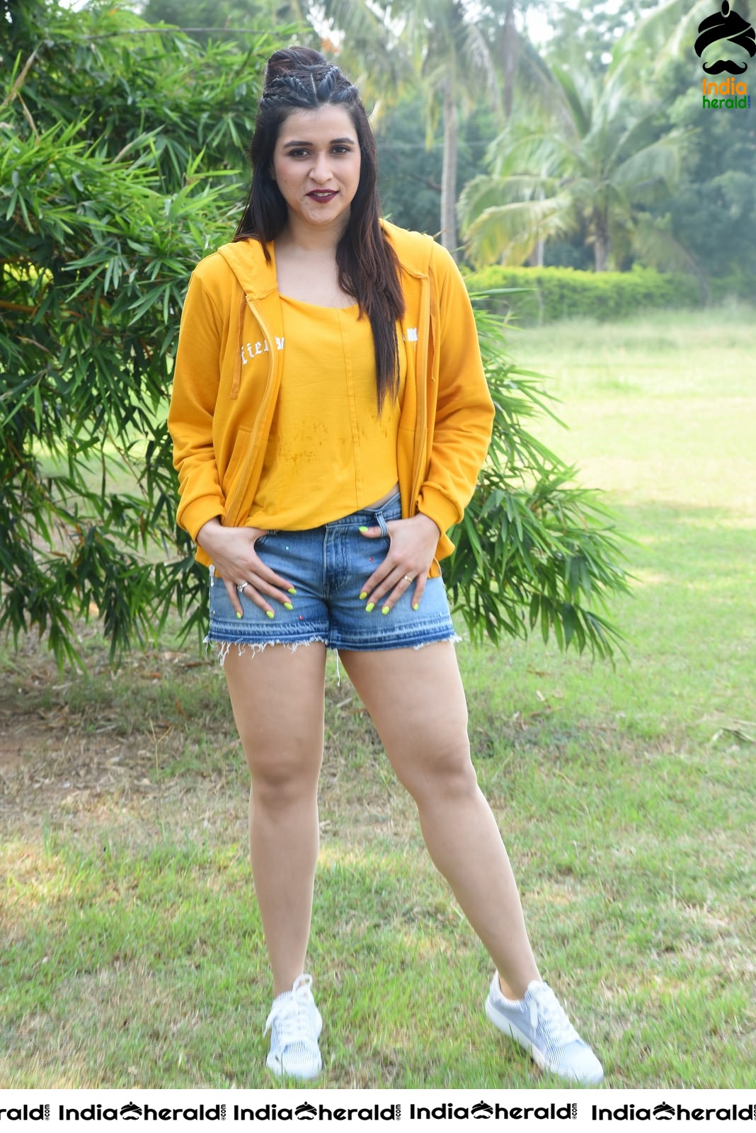 Mannara Chopra Hot Thighs Show in Sexy Shorts and Yellow Jerkin Set 1