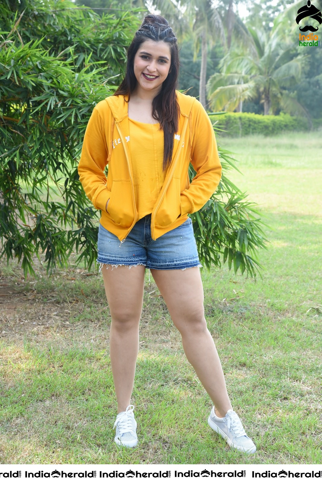 Mannara Chopra Hot Thighs Show in Sexy Shorts and Yellow Jerkin Set 1